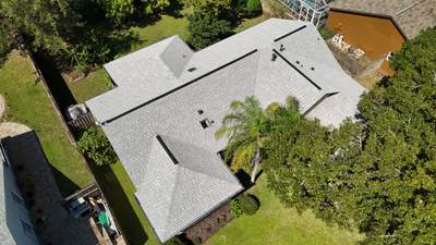 Comprehensive Roof Replacement w/ Old English Pewter Shingles & Black Ridge Vent in Melbourne