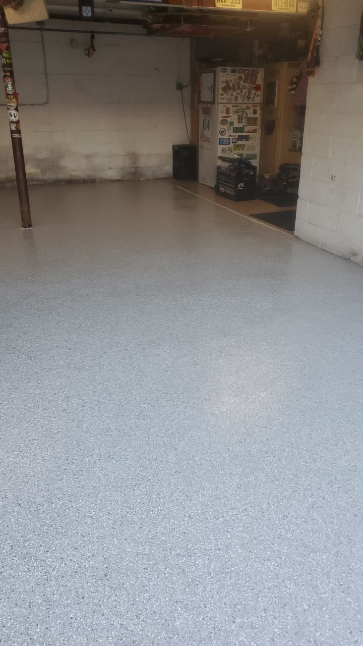 Garage Floor In Mt. Everest by Spectrum Painting, LLC