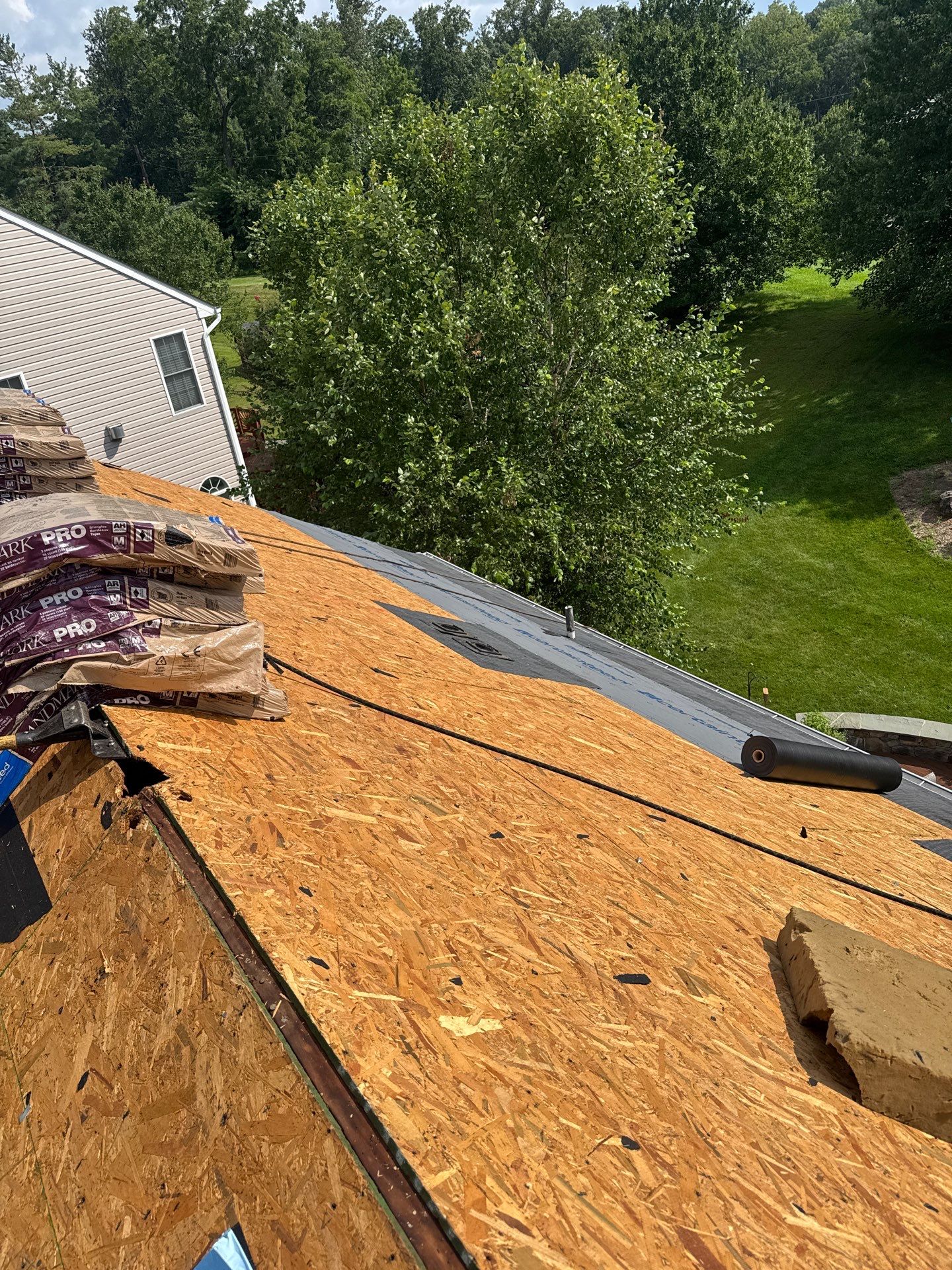 New Shingle Roof & New Gutters and downspouts with covers by Alpha Design Services