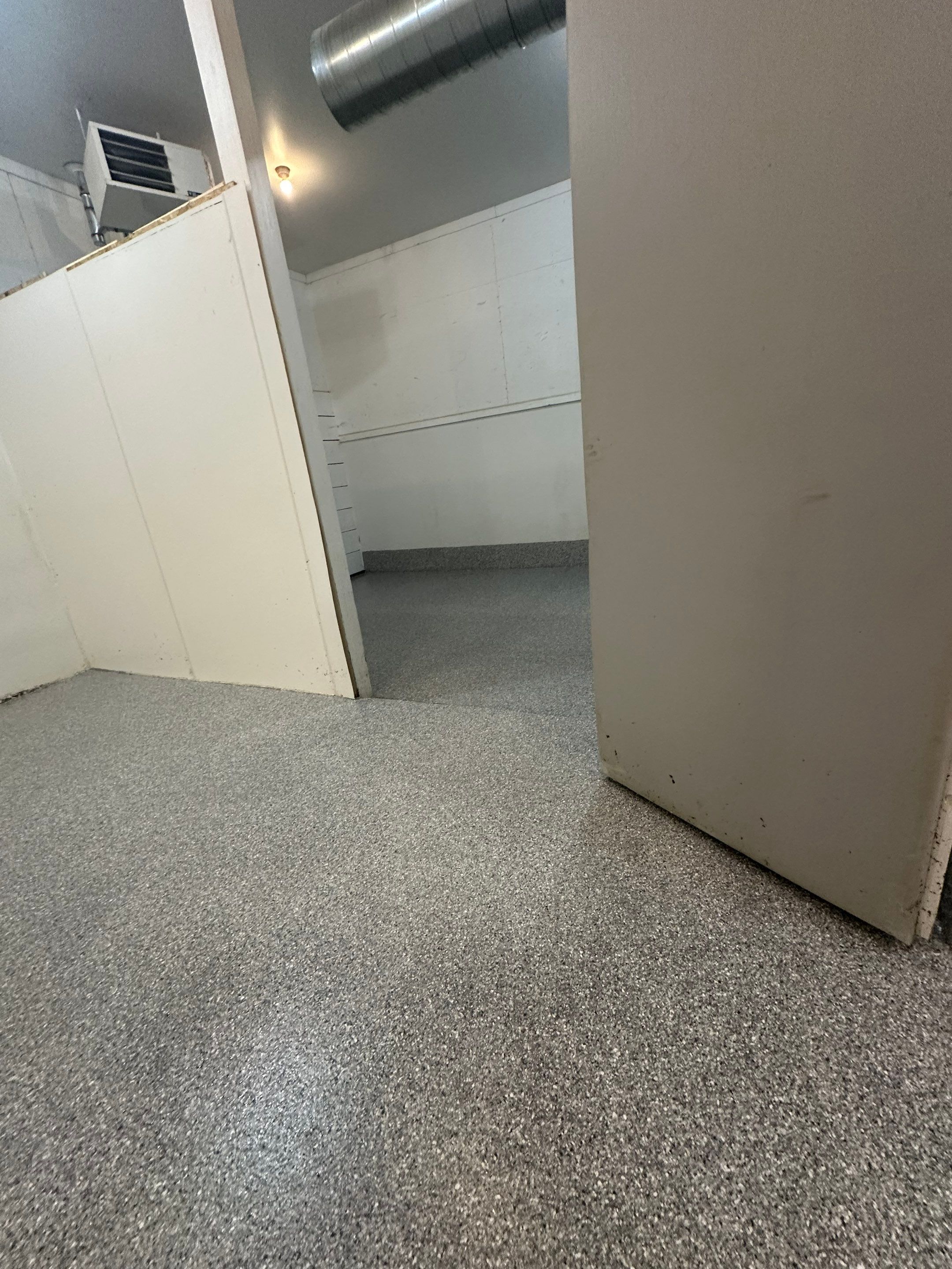 Durable Commercial Concrete Coatings for Brandon Valley Veterinary Clinic by Select Painting, Coatings & Garage Cabinets