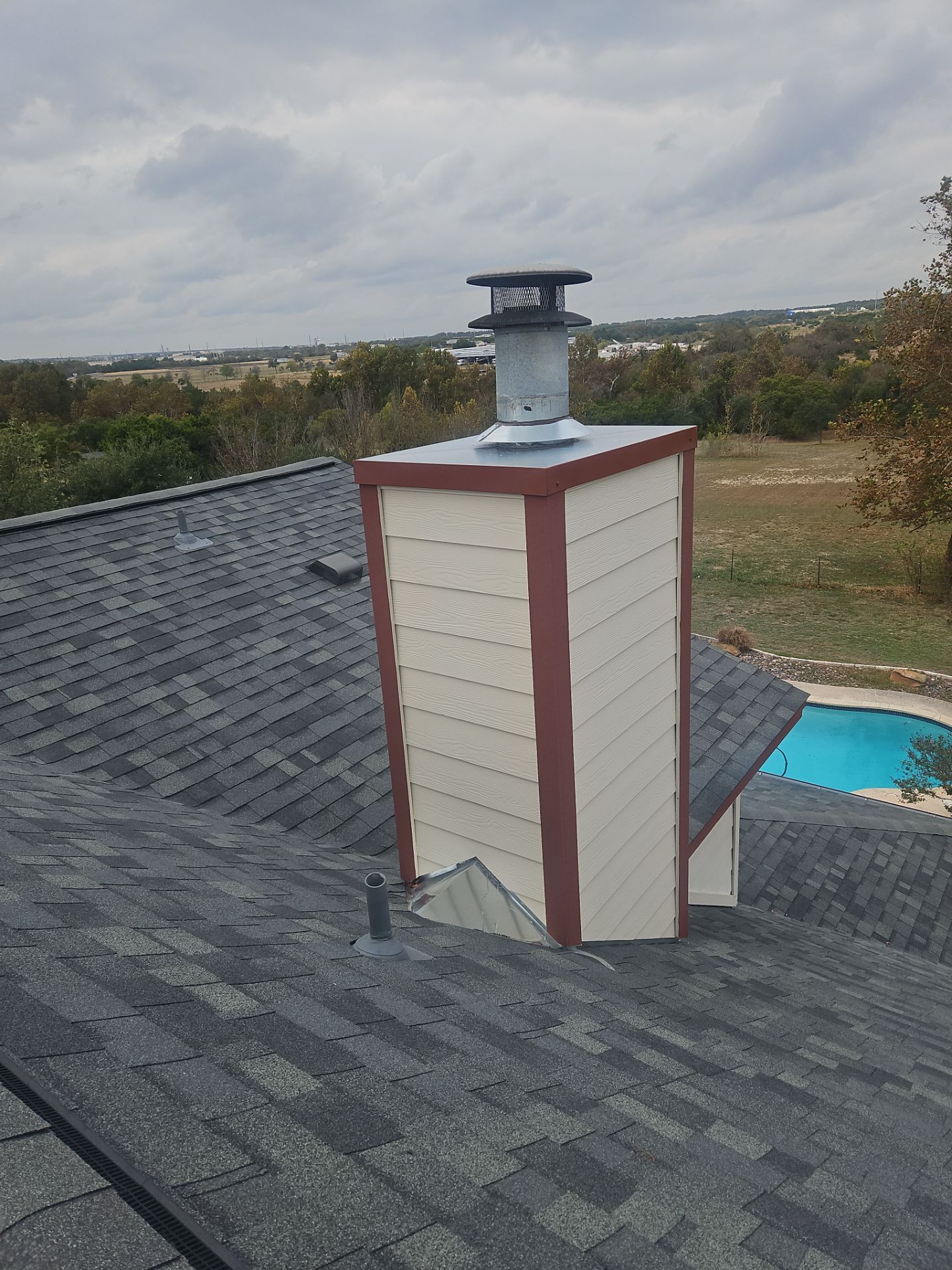 Residential Roof Replacement using Owens Corning - Oakridge - Estate Grey by Action Exteriors Austin