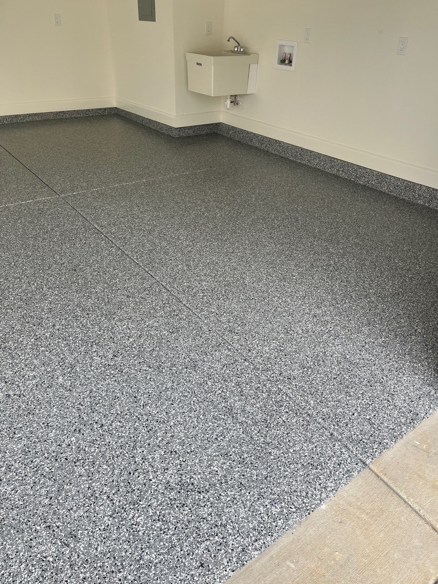 Garage Floor Coating using Wombat by My Garage Floor Guys