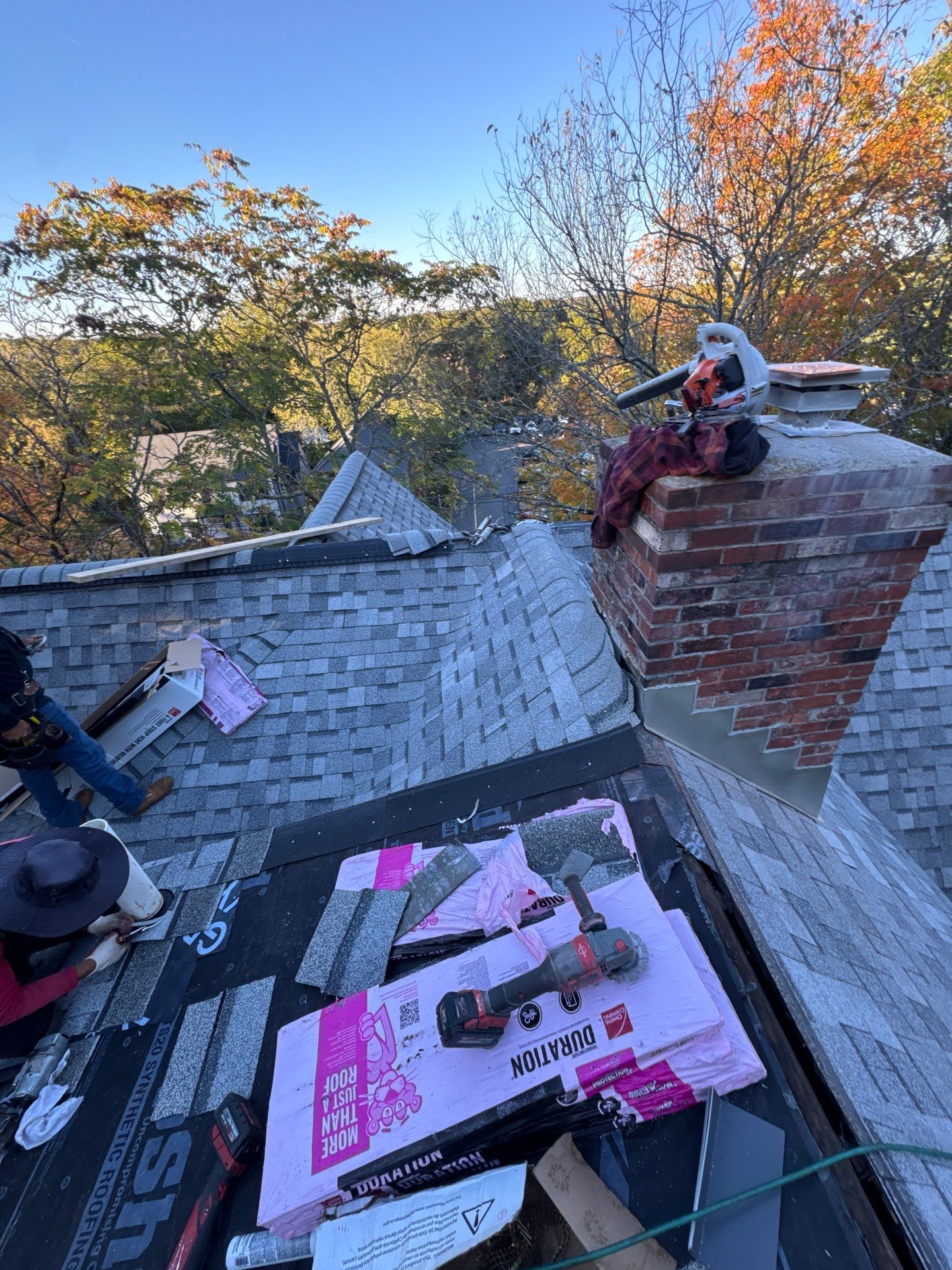 Full Roof & Porch EPDM Replacement with Skylight and Chimney Repairs by Mighty Dog Roofing of Greater Middlesex County