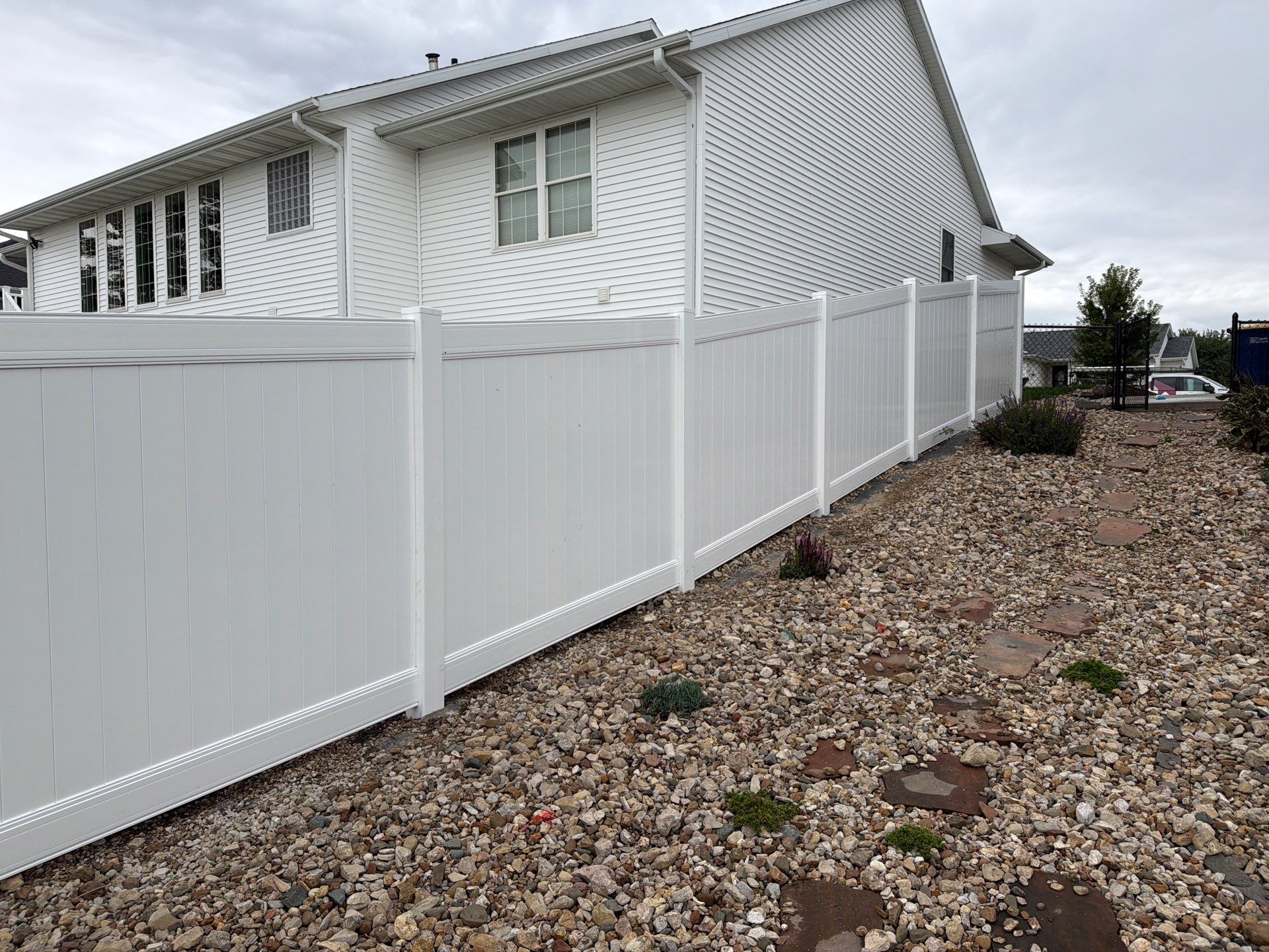 Residential Vinyl Privacy Fence Installation in Urbana by Perfect Picket Fence and Stain