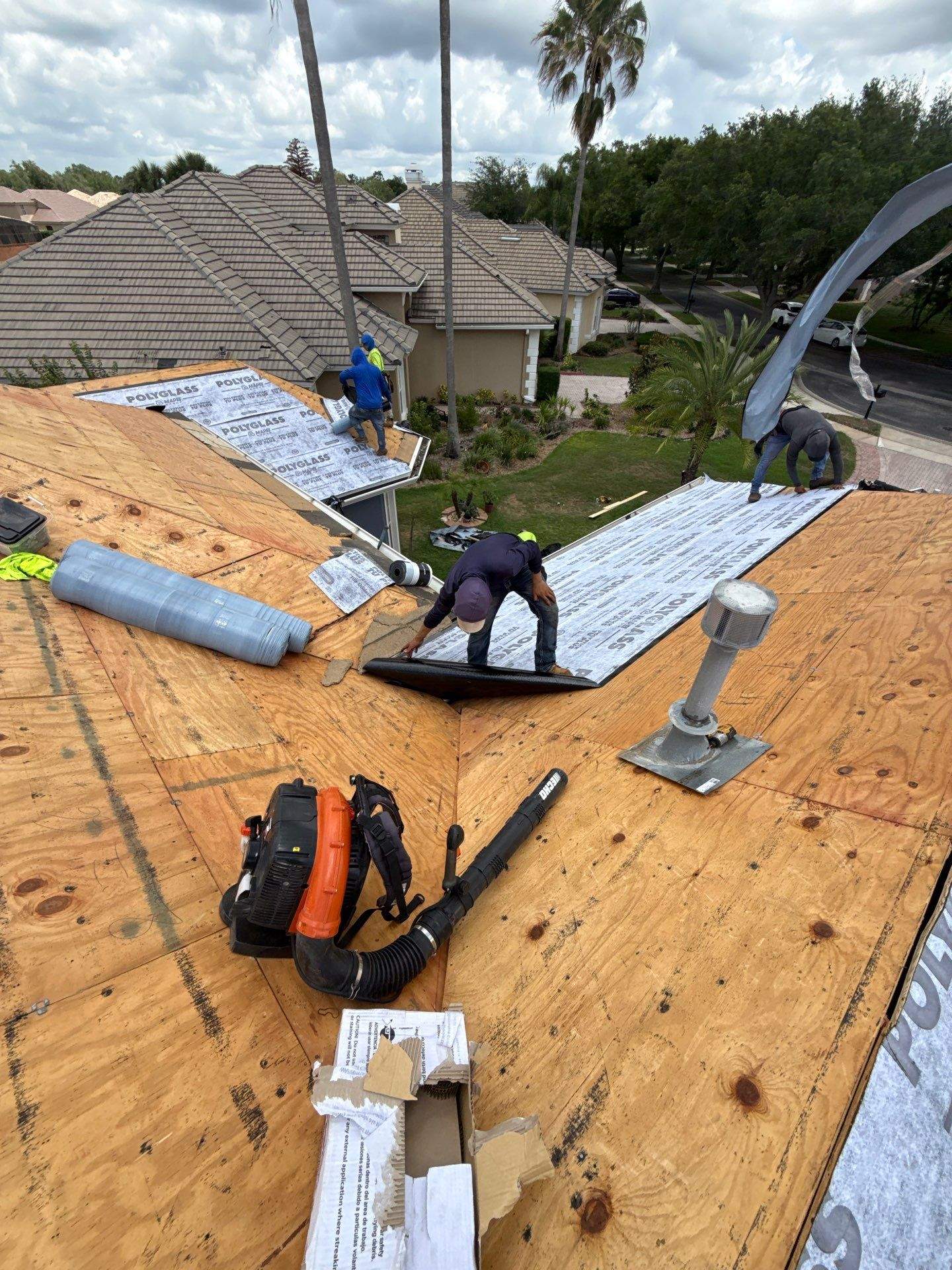 Winter Park Concrete Tile Roof Replacement and Chimney Flashing Installation by Fortified Roofing Solutions Corp.