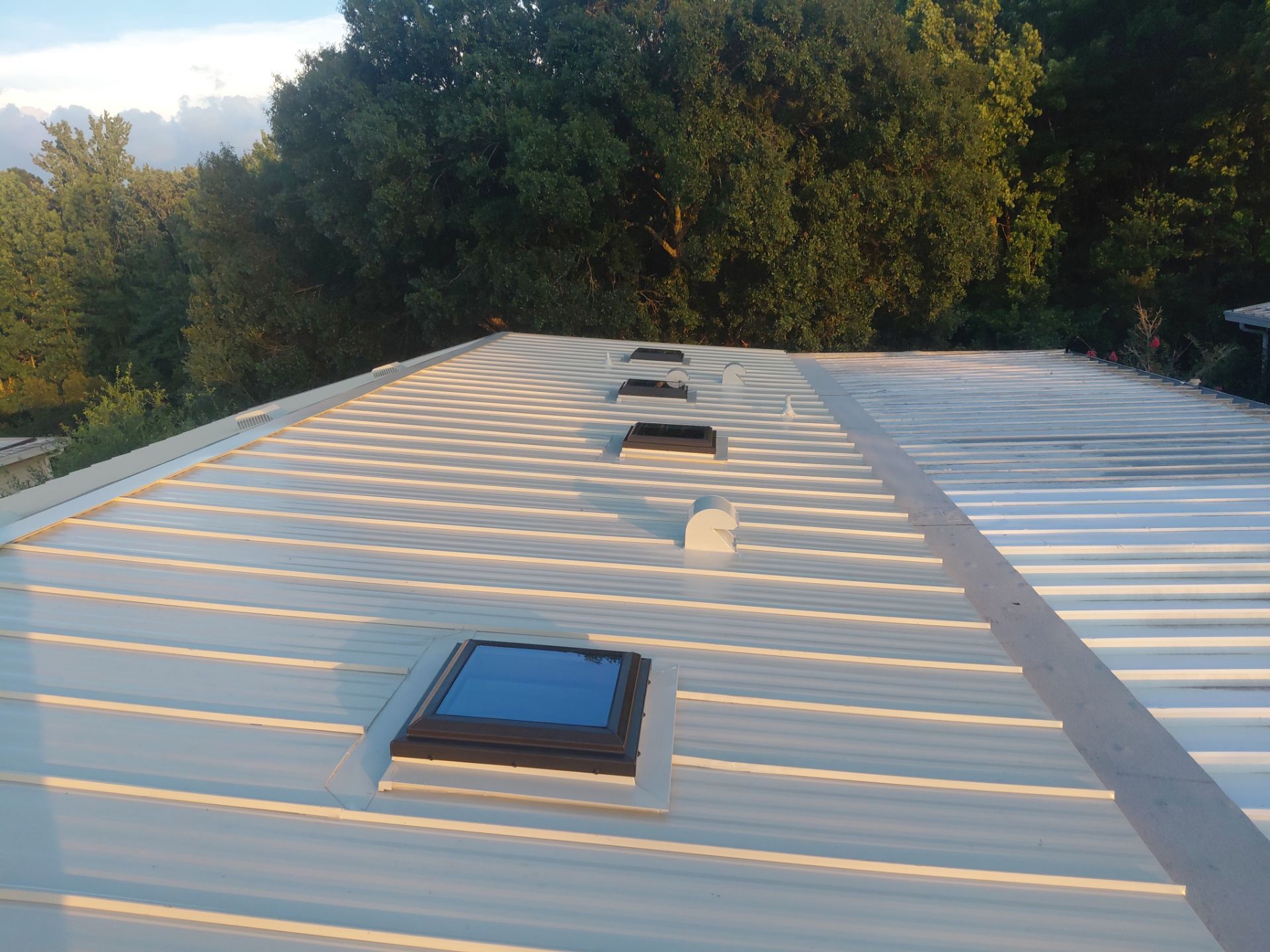 Orlando Residential Standing Seam Metal Roof Installation in Light Stone by Pinnacle Roofing Group