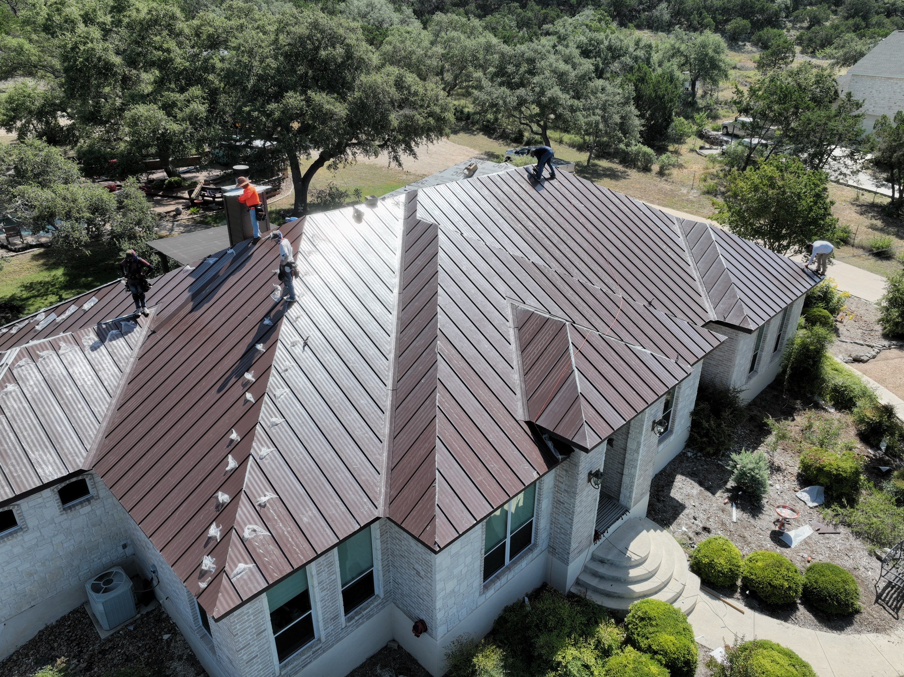 Residential Metal Roof Installation using McElroy Metal by Premier Roofing and Contracting