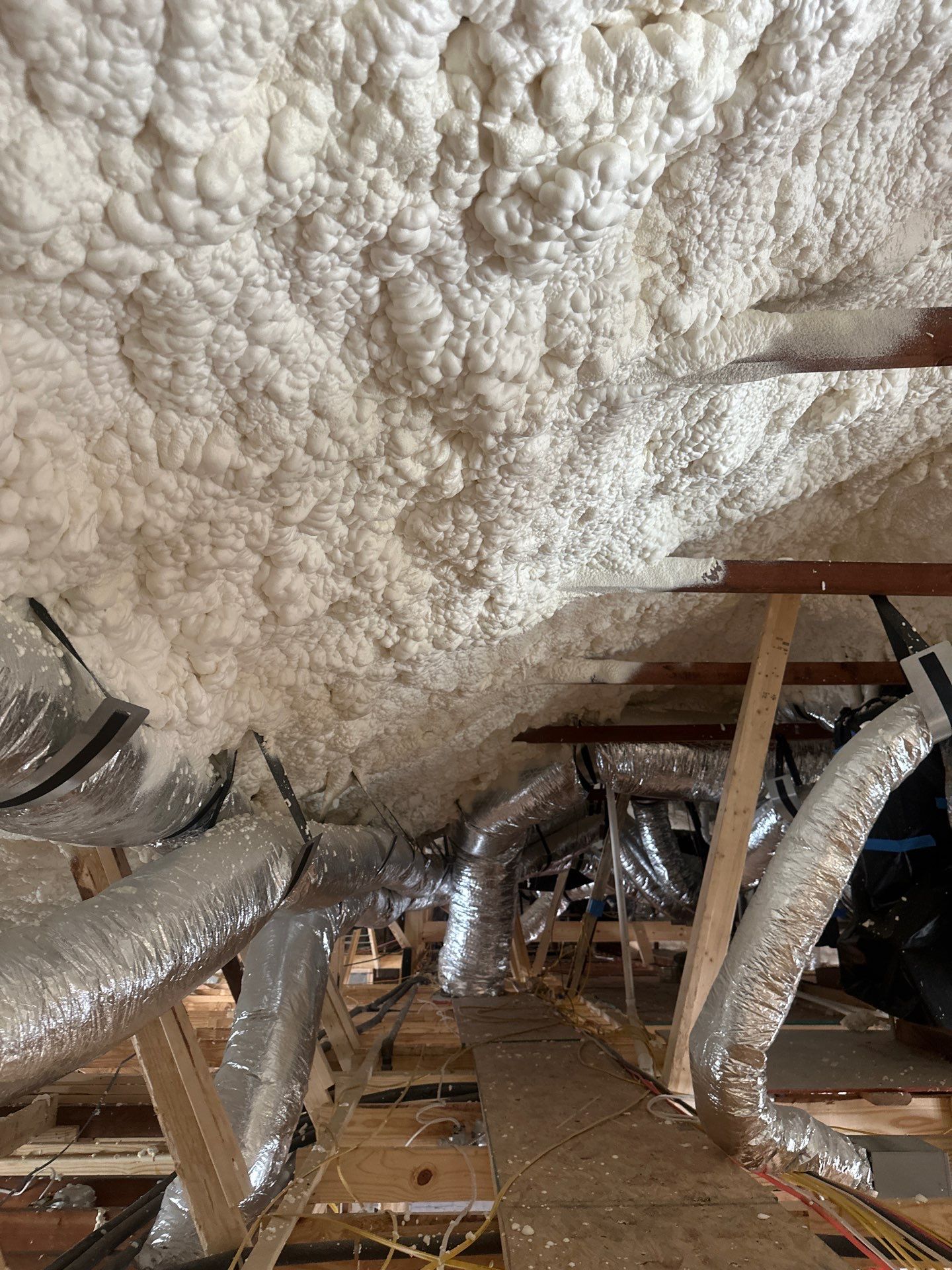 Open cell spray foam & rockwool job completed in Dallas TX by Apex Insulation Solutions