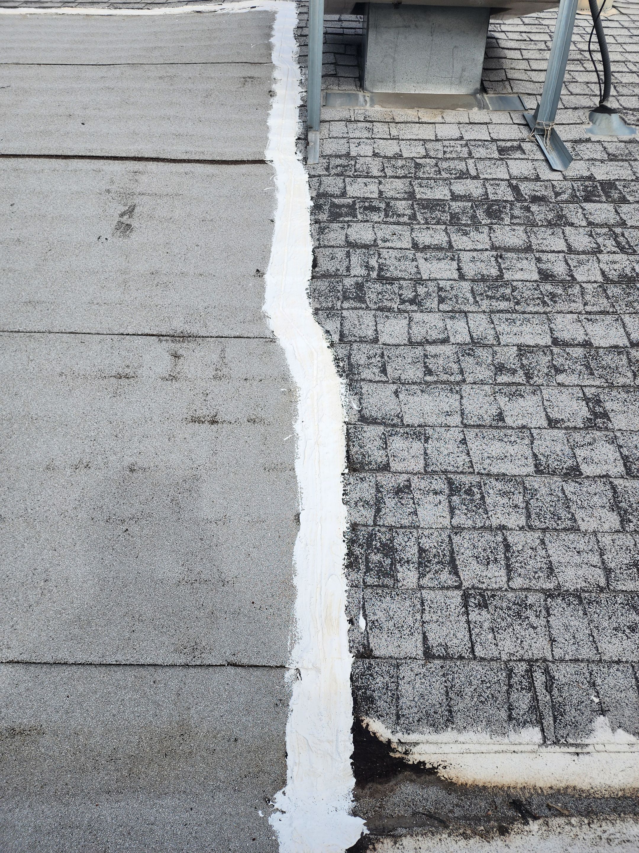 Foam and coatings on commercial roof by Straight Edge Roofing Inc