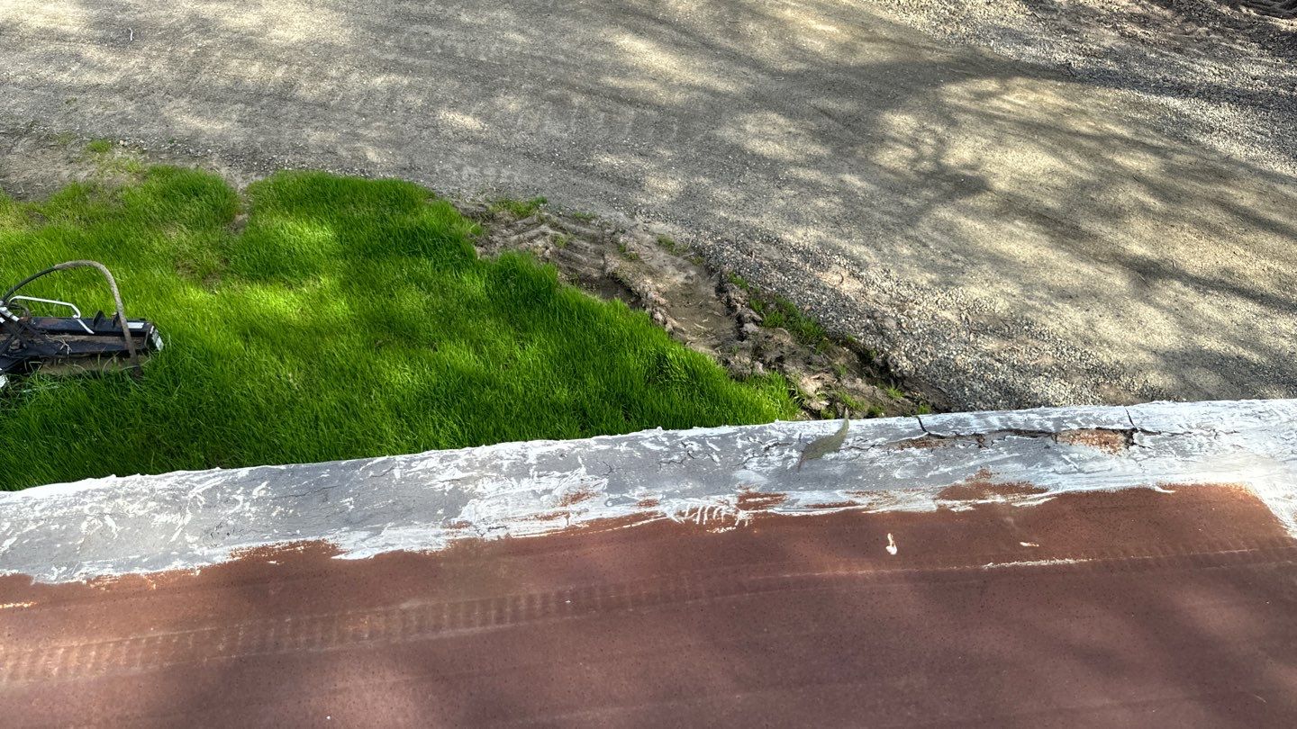 Foam and coatings on mobile home by Straight Edge Roofing Inc