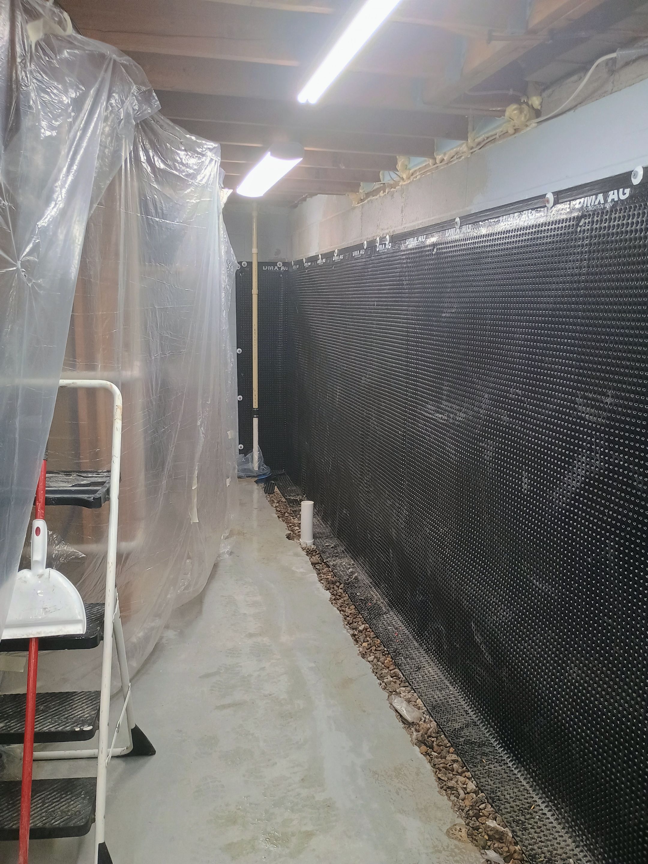 Depressurizing Denny's Basement Wall by Waterproofing Northeast