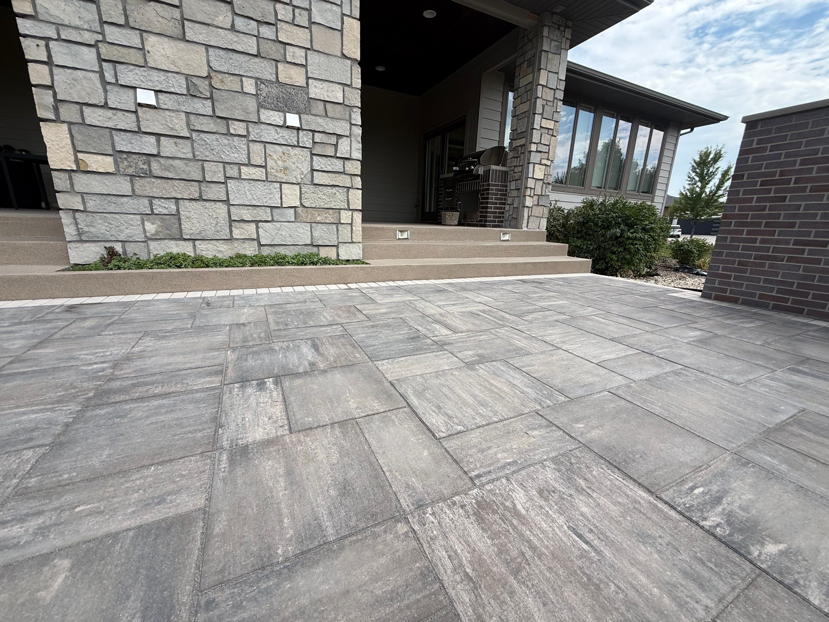 Sioux Falls Patio Concrete Coating and Porch Step Repair by Select Painting, Coatings & Garage Cabinets