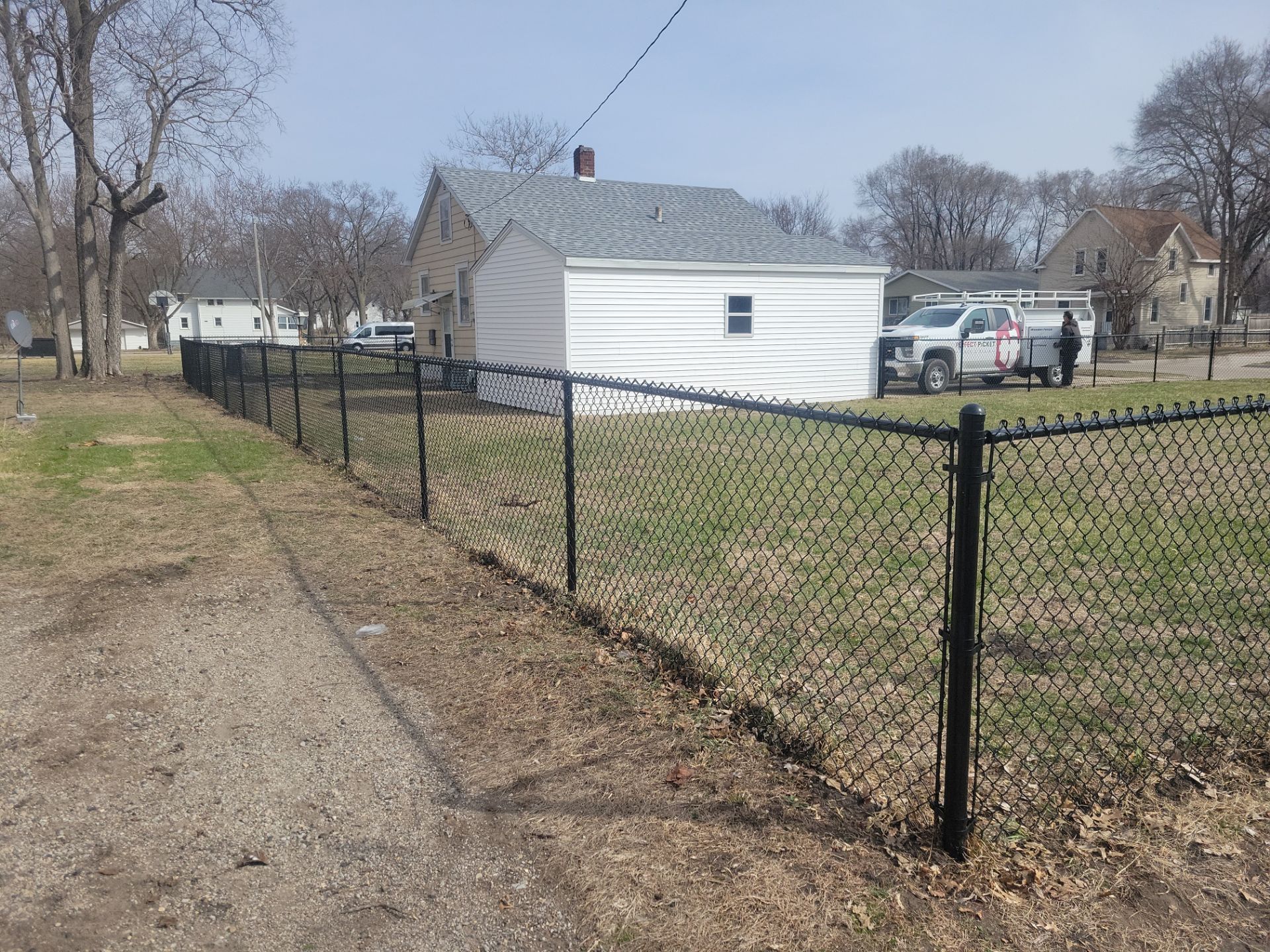 Black Chain Link Fence and Gate Installation in Waterloo by Perfect Picket Fence and Stain