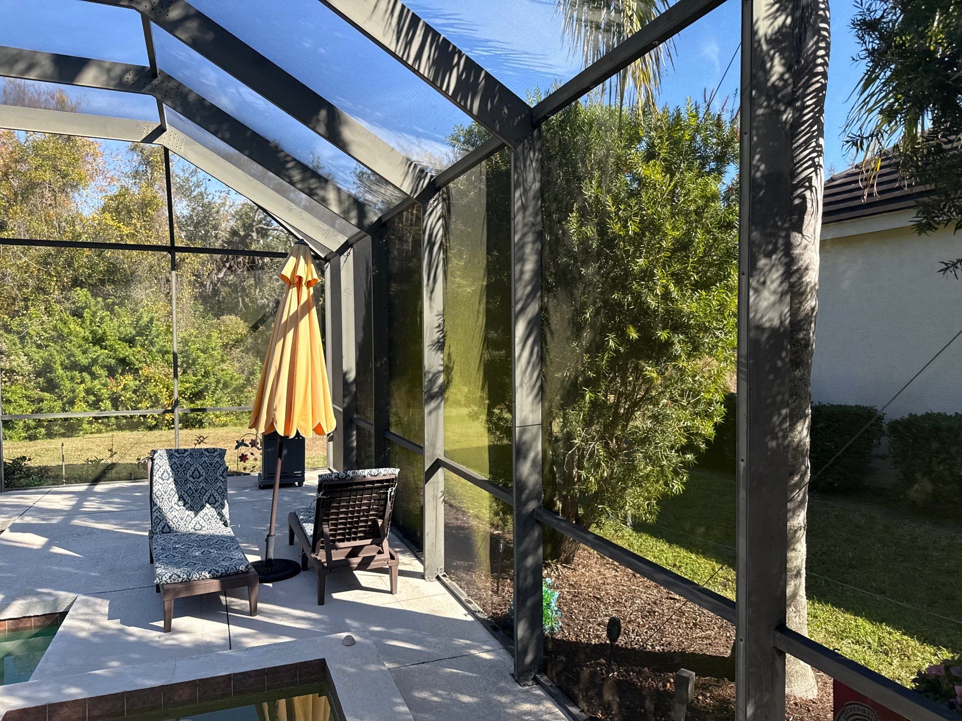 Painted Pool Deck, Lanai & Pool Cage Cleaning in River Club South – Bradenton, FL by Sunshine AquaWash