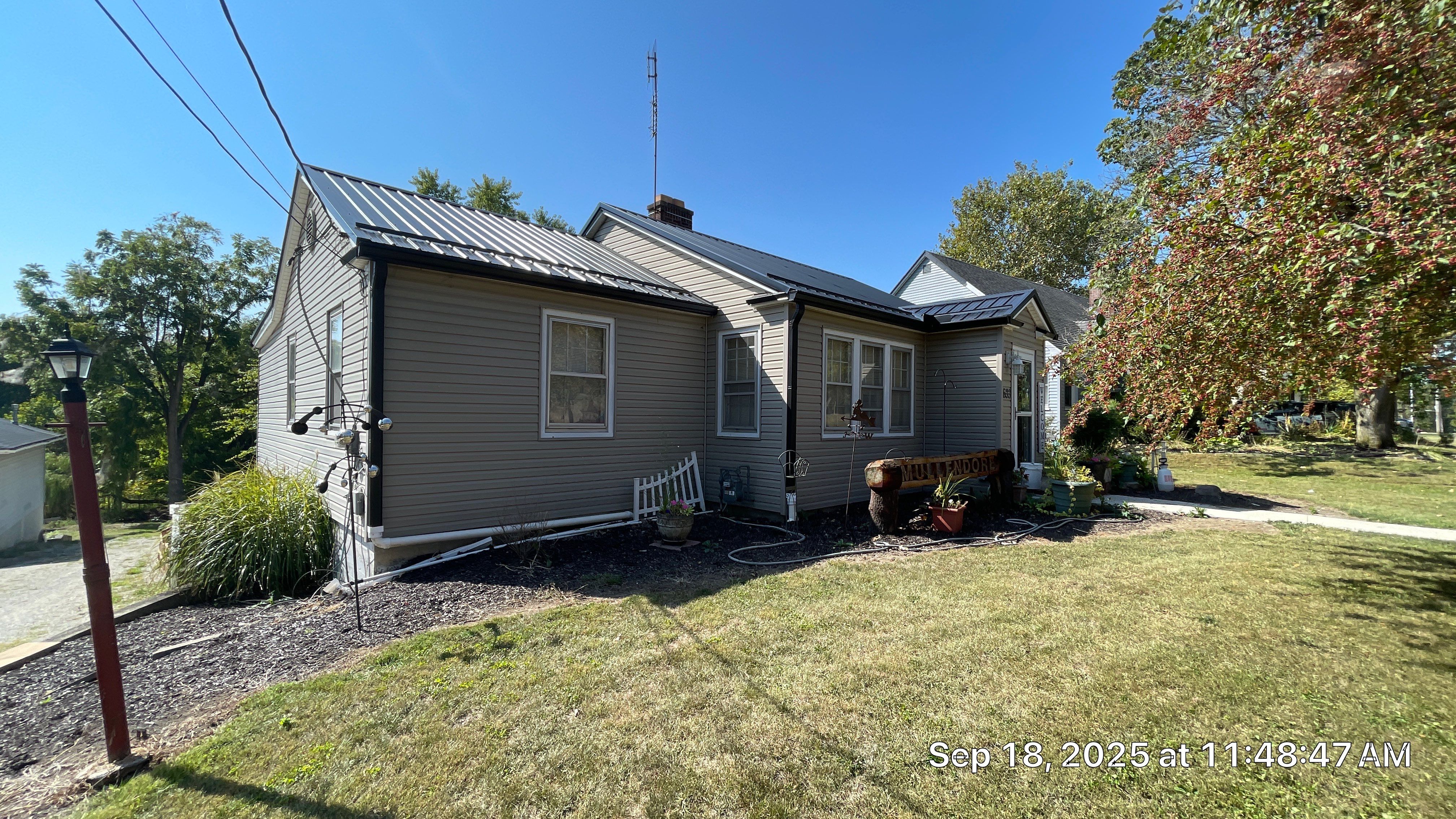 12 Replacement Triple Panes and 1 Entry Door in Columbia City, In by Window World Of Fort Wayne