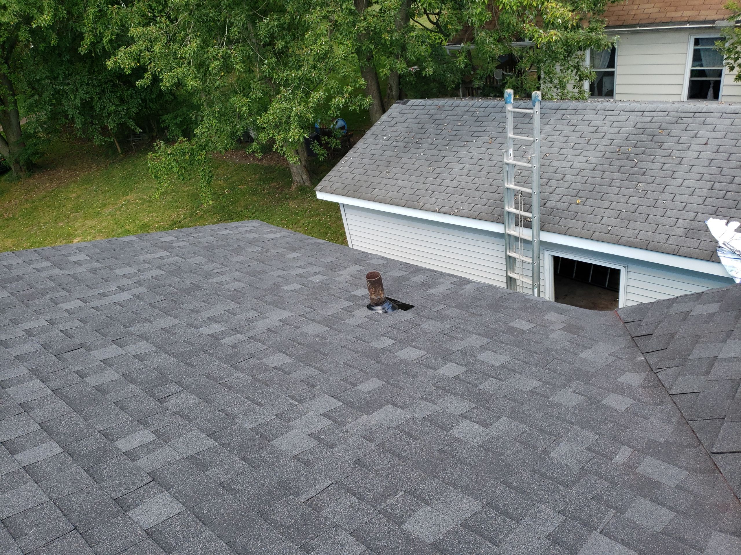 ATLAS PINNACLE COLOR: PRISTINE SCHOTCHGARD BLACK SHADOW DRIP EDGE: BLACK by Eagle Eye Roofing