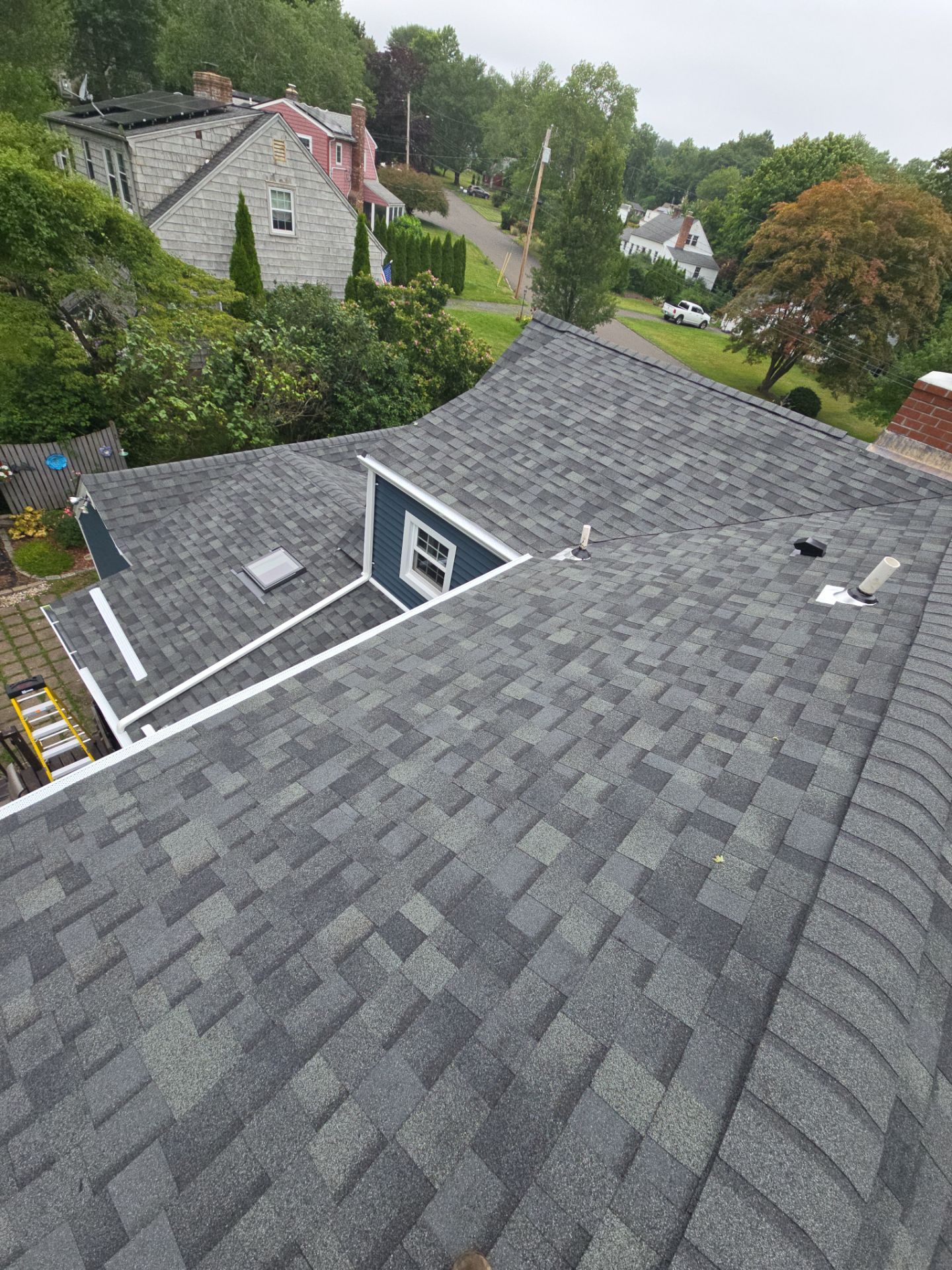 Complete Exterior Estate gray with Pacific Blue Siding by A Plus Exterior