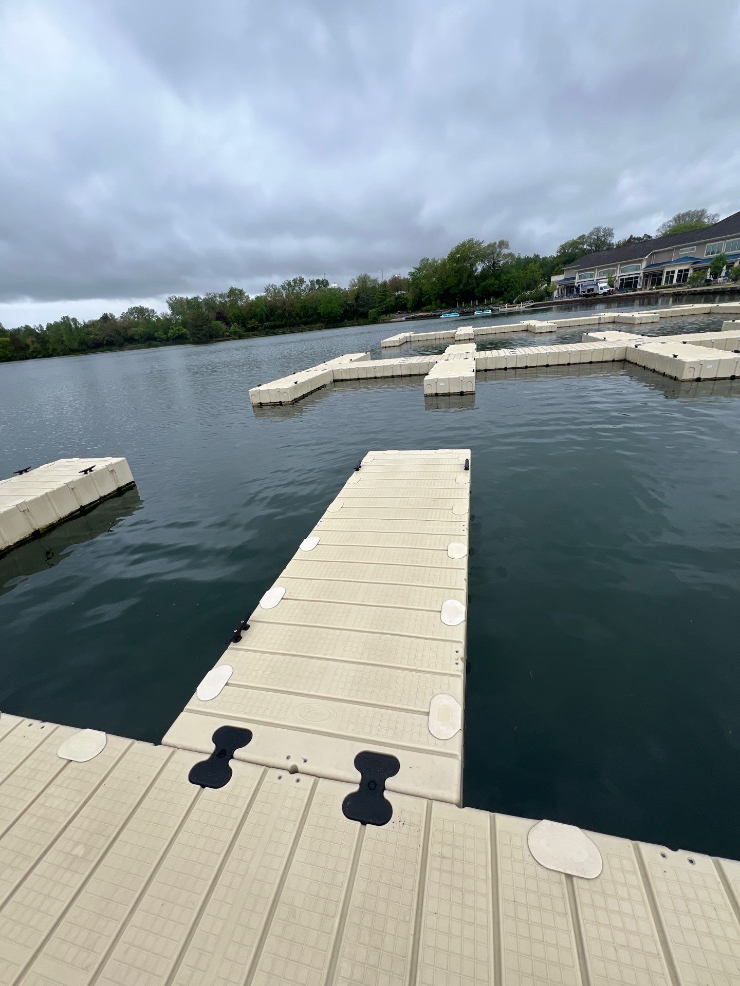 Power washing of floating dock by Northern Power Washing LLC.