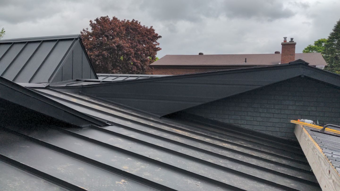 Residential Roofing Installation using 16" Standing Seam Panels by Jay Carter Roofing & Sheet Metal