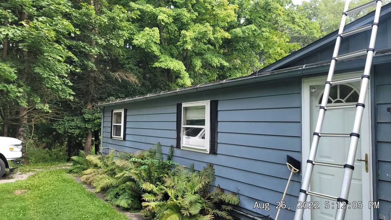 ATLAS PINNACLE COLOR: COASTAL GRANITE DRIP EDGE: BLACK by Eagle Eye Roofing