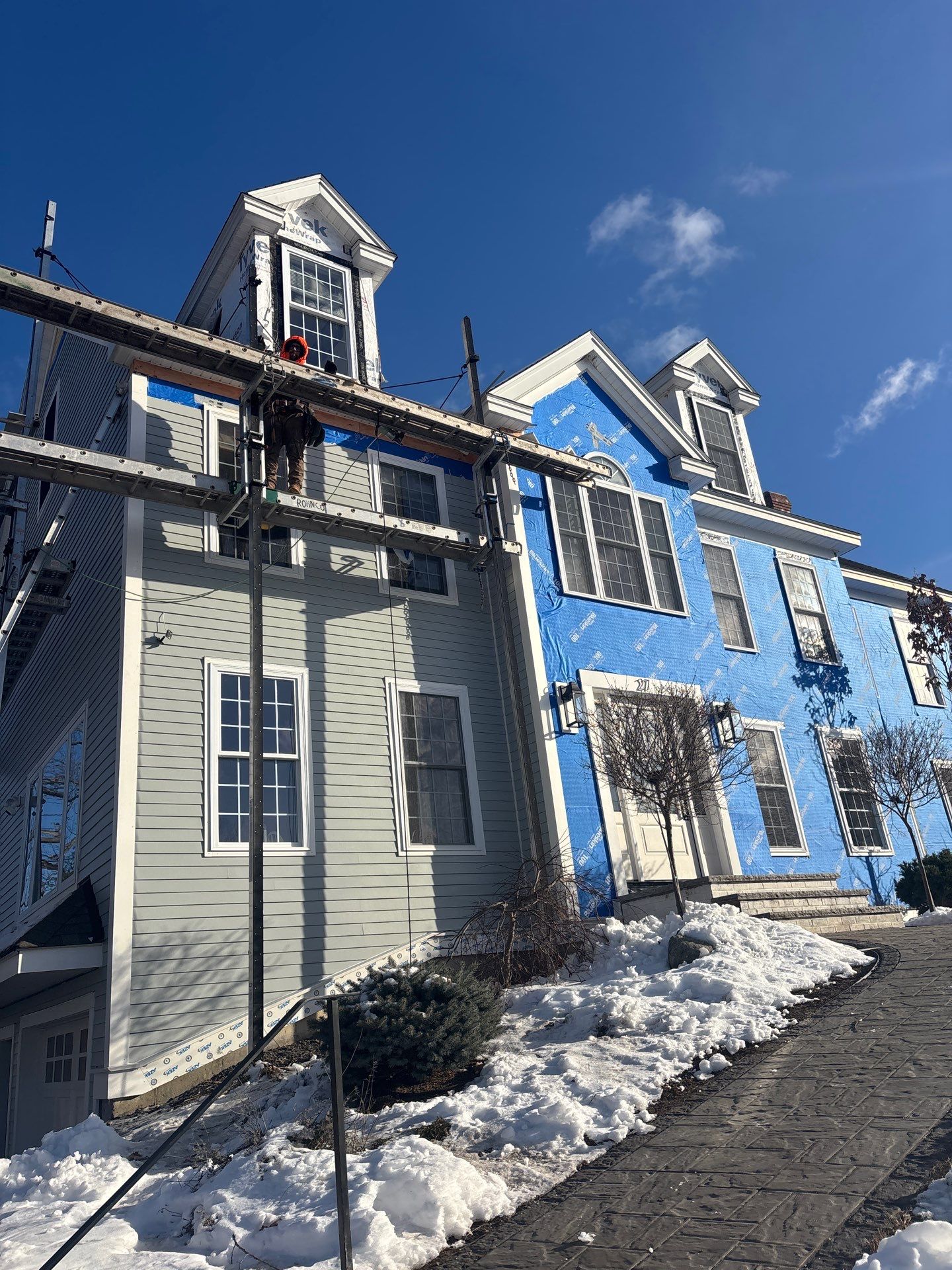 Complete Home Renovation with James Hardie® Clapboard & Shake Siding and Custom PVC Trim by Sensible Home Solutions
