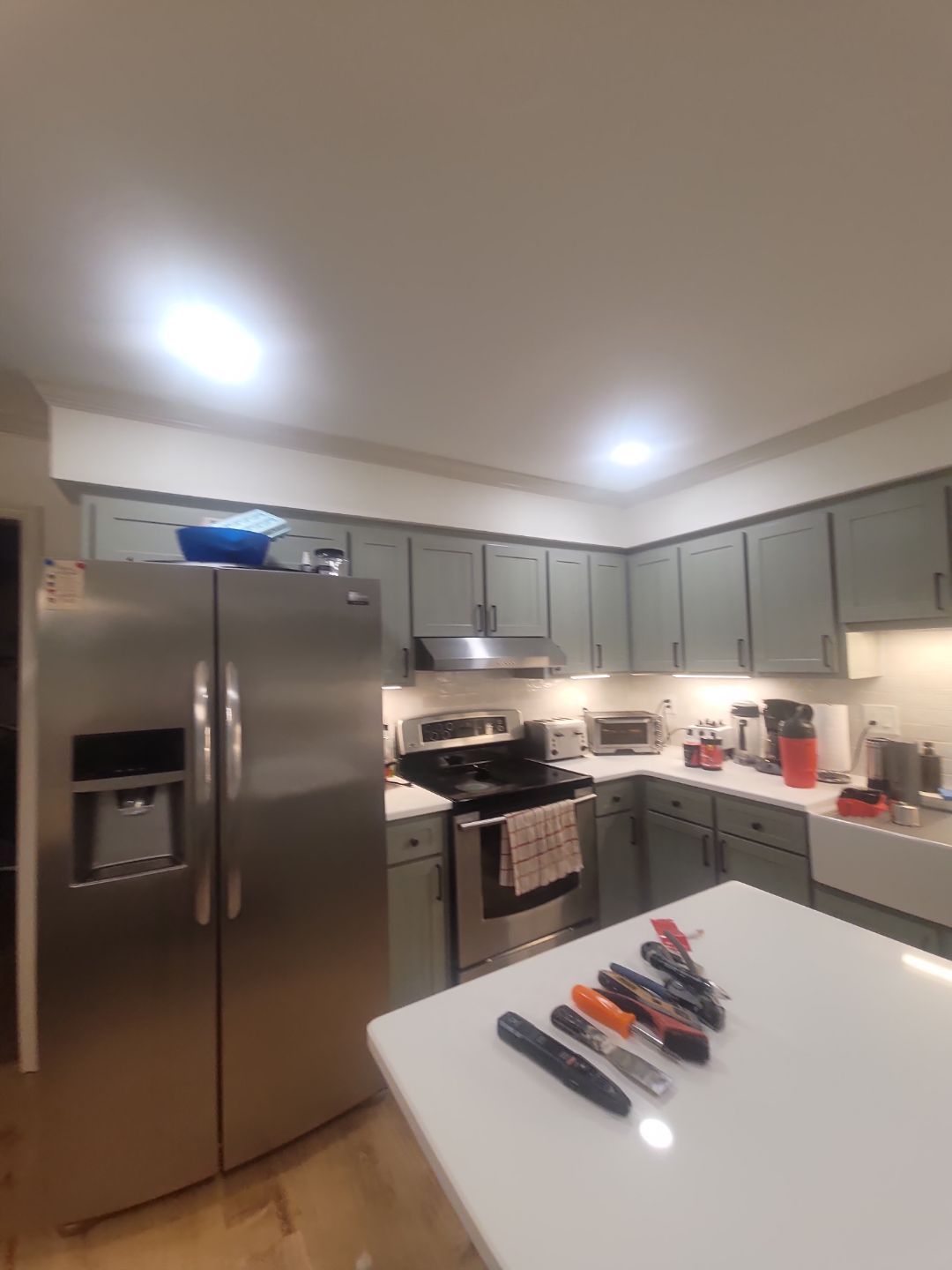 A Pathway to Personality – A Two-Tone Kitchen Transformation in Apex by Elite Remodeling and Design LLC