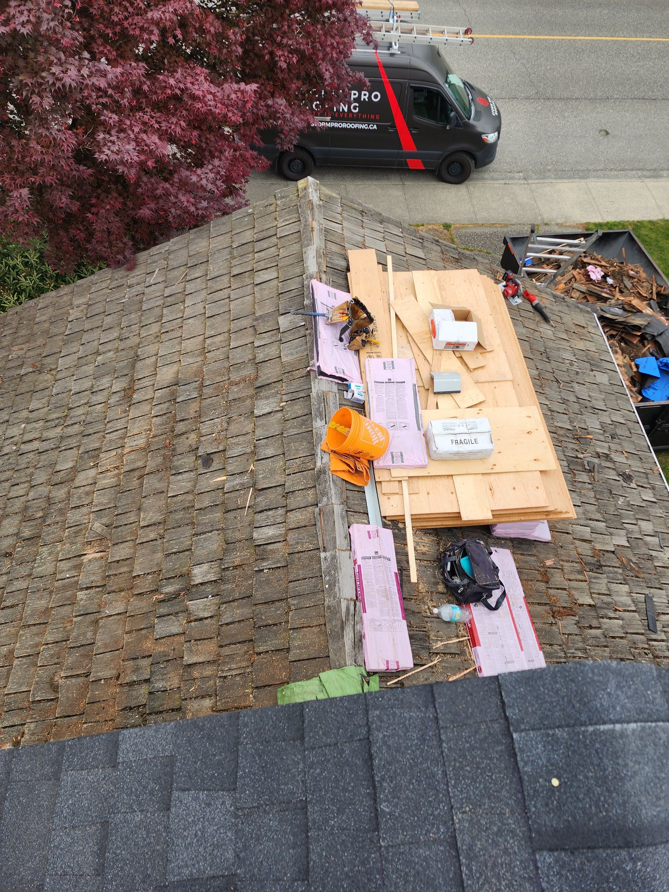 Residential Cedar ReRoofing Installation using OC Oakridge shingles by Top Notch Roofing Inc