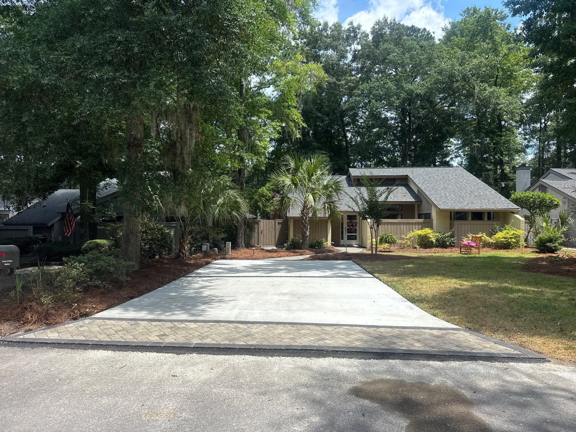 Custom Concrete Patio and Herringbone Paver Walkway in Hilton Head Island by Lowcountry Scapes, LLC