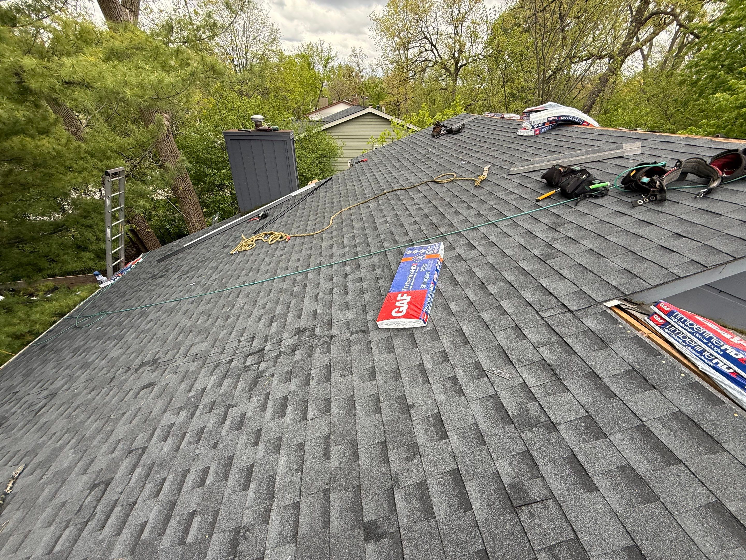 Roof replacement and chimney flashing by Optimal Home Improvement 