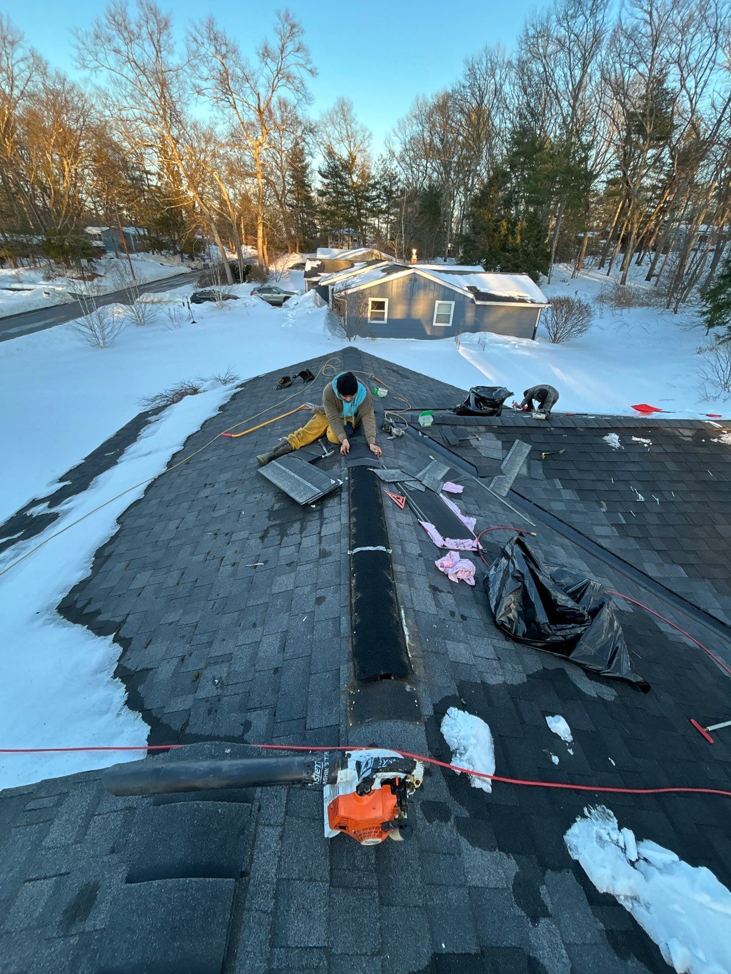 Ridge Cap Replacement & Black Metal Valley Installation in Chelmsford, MA by Mighty Dog Roofing of Greater Middlesex County