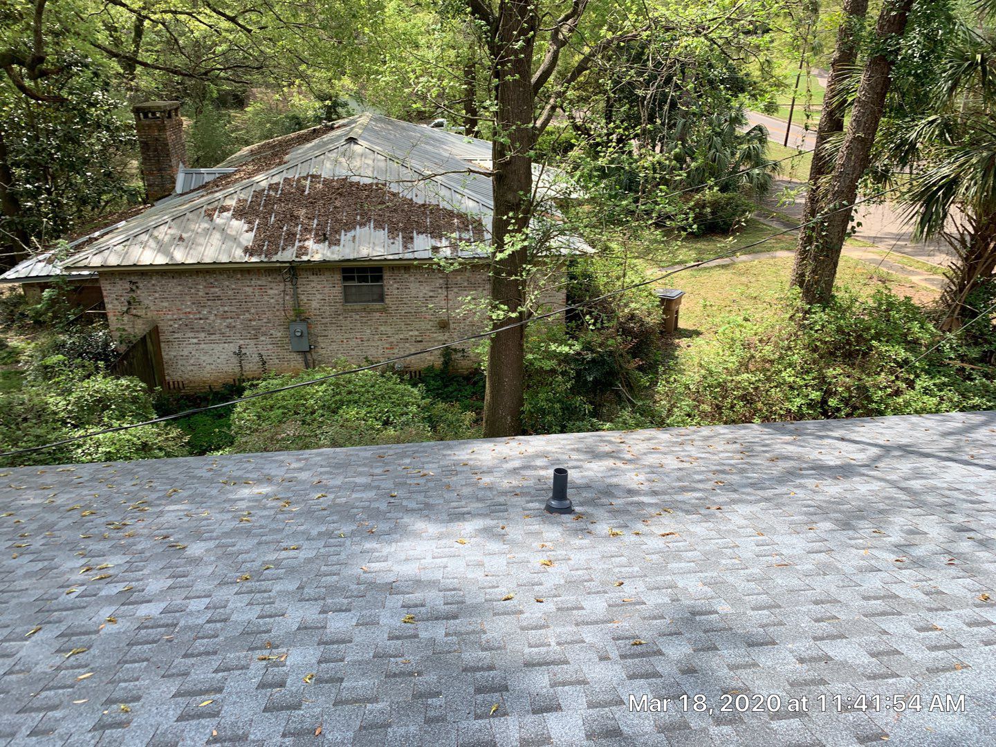 Residential Roofing Installation using Roof Replacement by American Roofing & Construction LLC