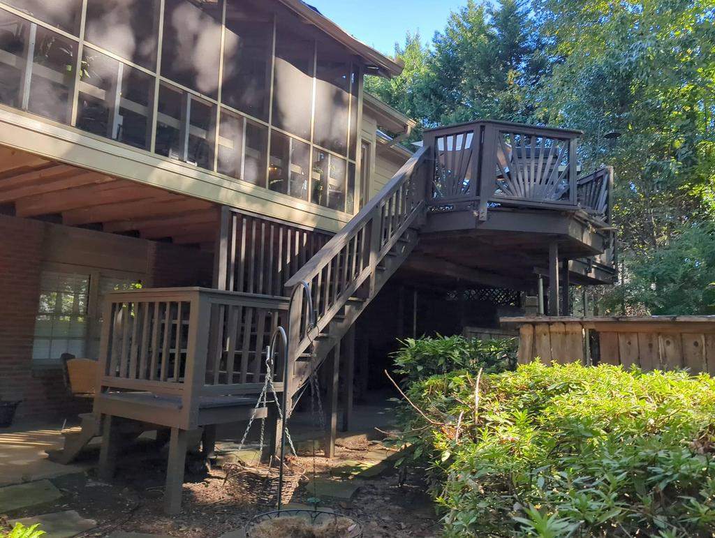 Deckorators Voyage Deck and Shed Style Covered Porch Build with Drink Rail by Nelson Exteriors 