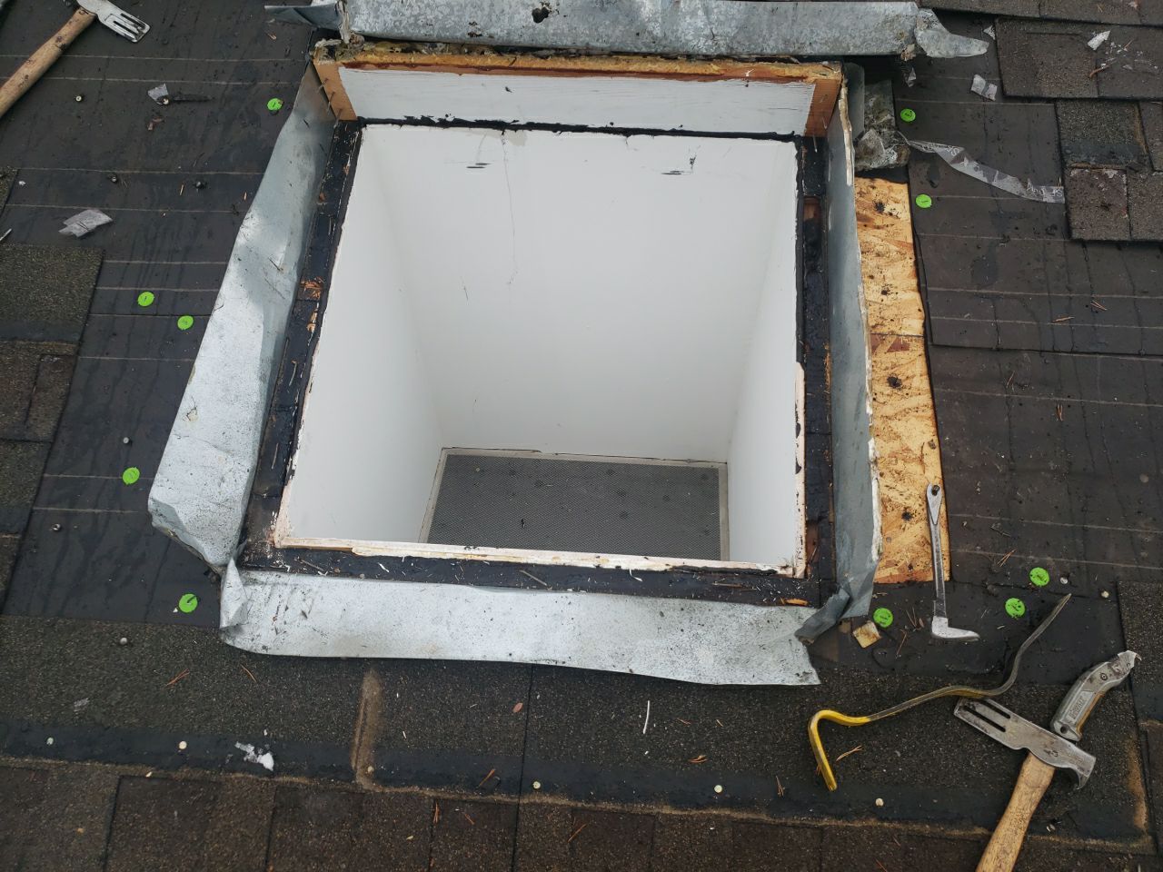 Skylight Removal using Shingle Repair by The Roof Doctor