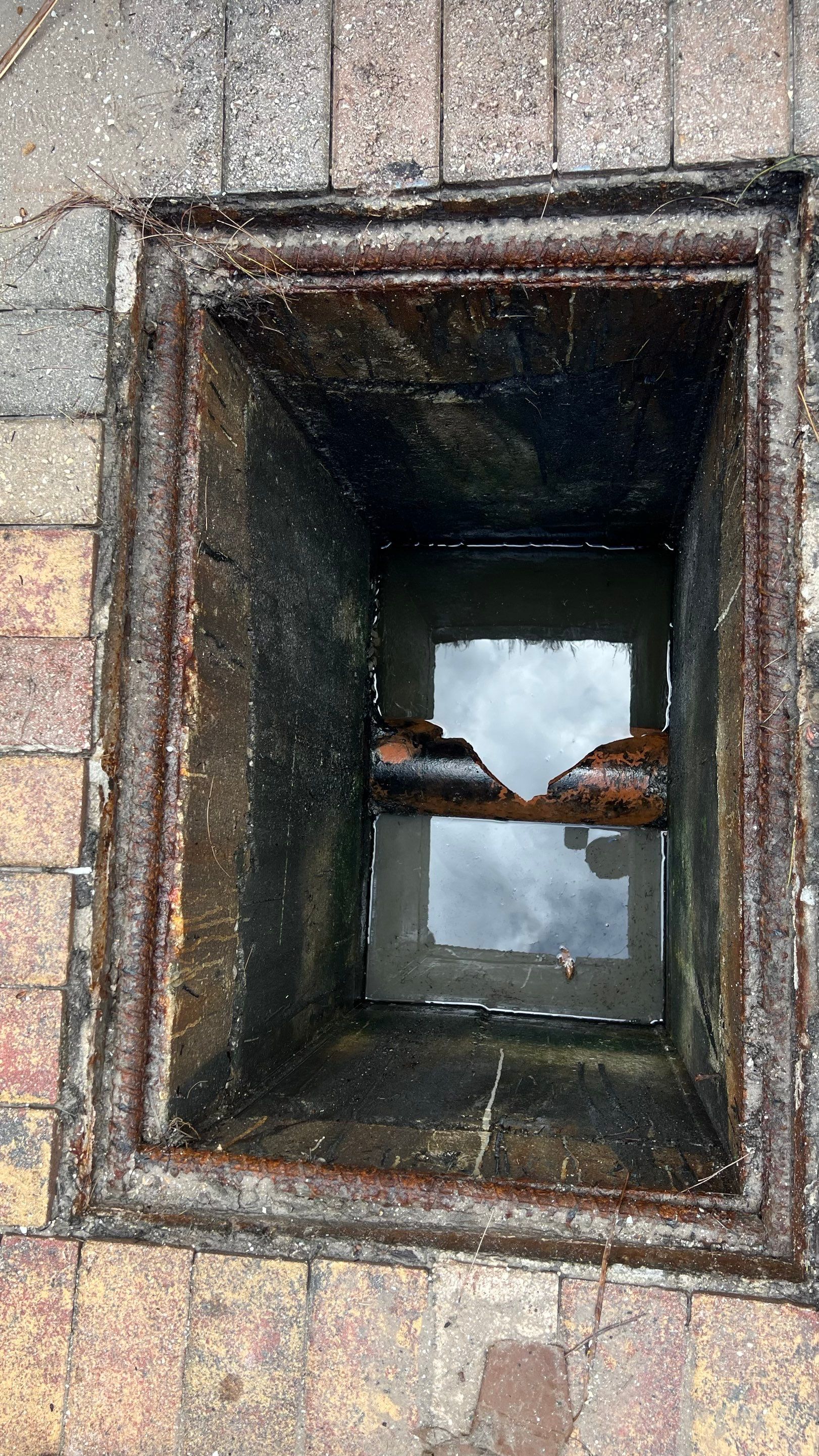 Catch Basin Cleaning After Hurricane Milton Naples Condo by APS Power & Water