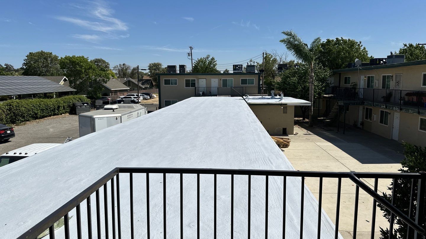 Foam Refurbish using General Coatings acrylic coatings and spray foam by Straight Edge Roofing Inc