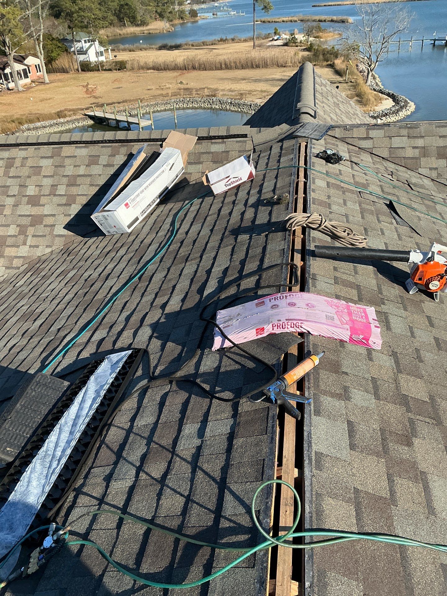 Waterfront Roof Replacement in White Stone, VA by Cade Construction