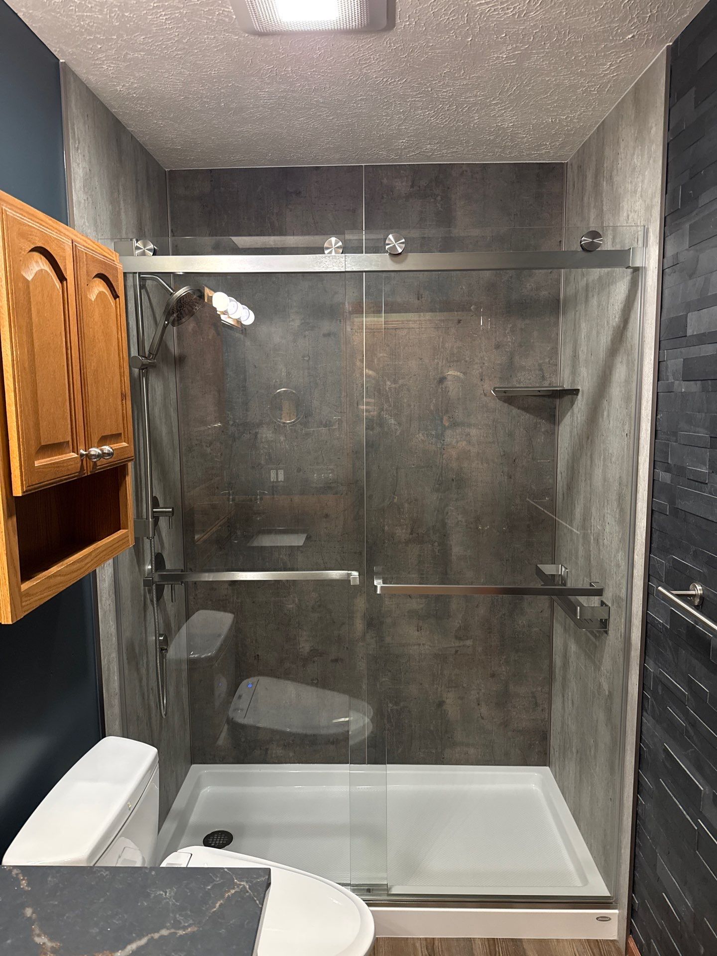 Acrylic Jacuzzi Bath and Shower Surround Installation in Traverse City by Rainbow Seamless Systems
