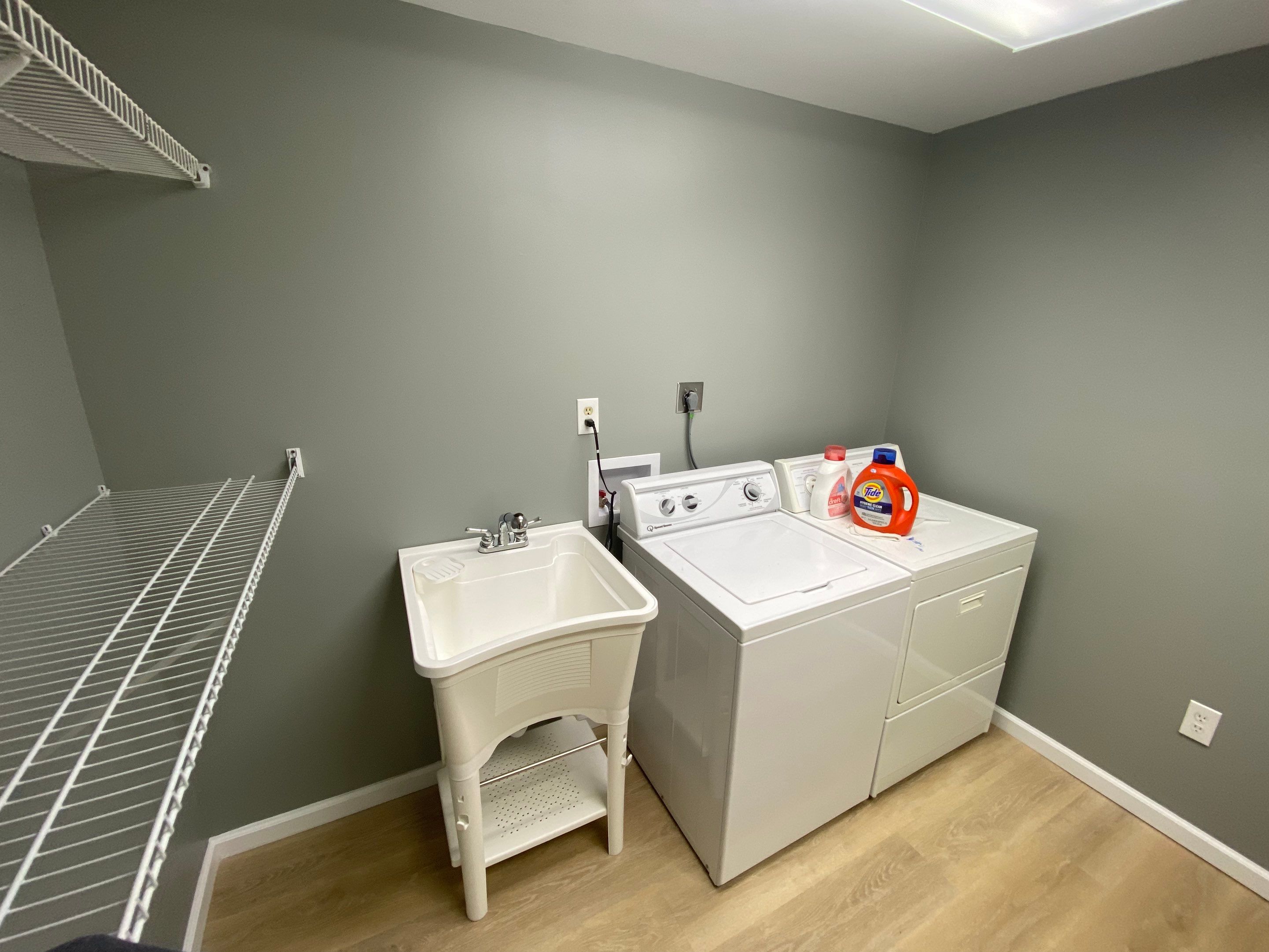 Laundry Room Redmodel using Lifeproof Luxury Vinyl Plank Flooring by The Smet Companies, LLC