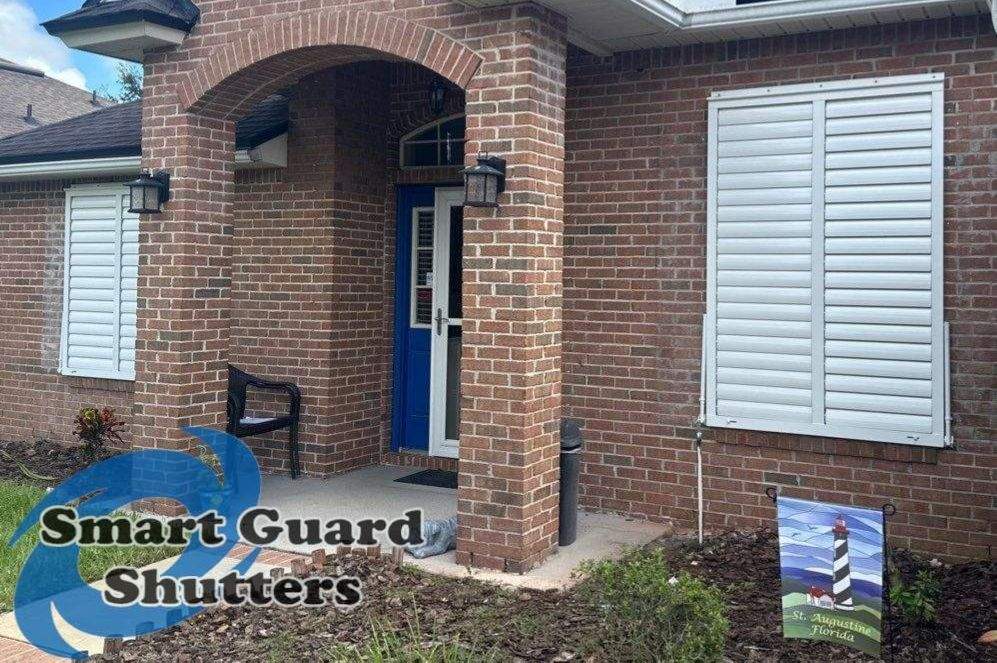 Impact Bahama Shutters in Signal White by Smart Guard Shutters