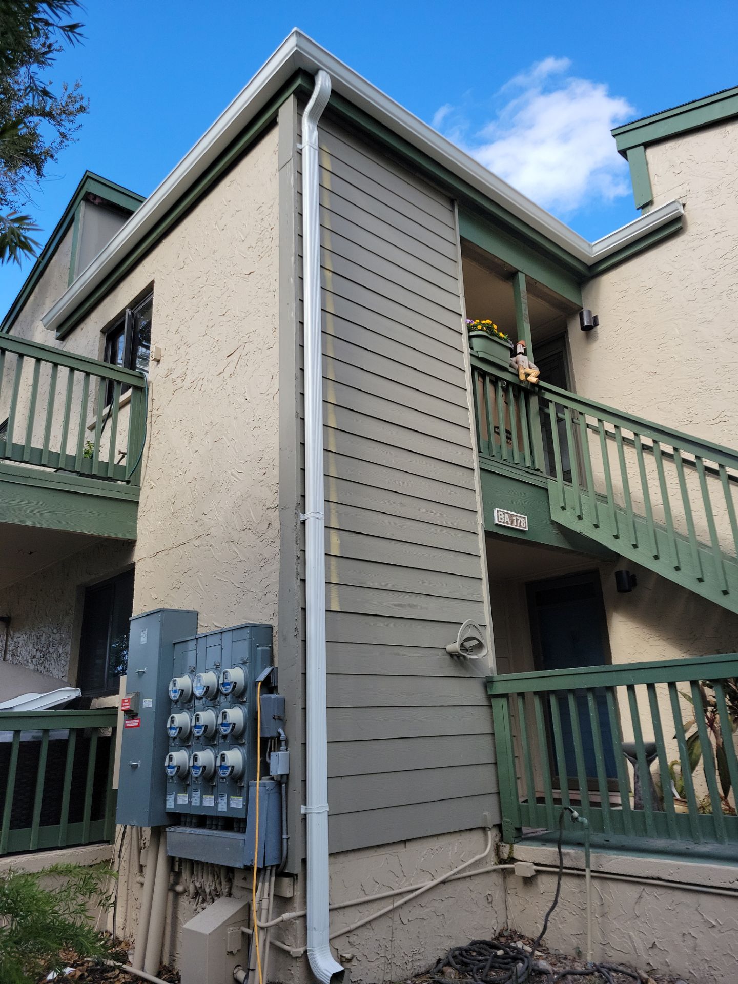White Gutters Repair and Installation in Sarasota FL by Gutter Professors