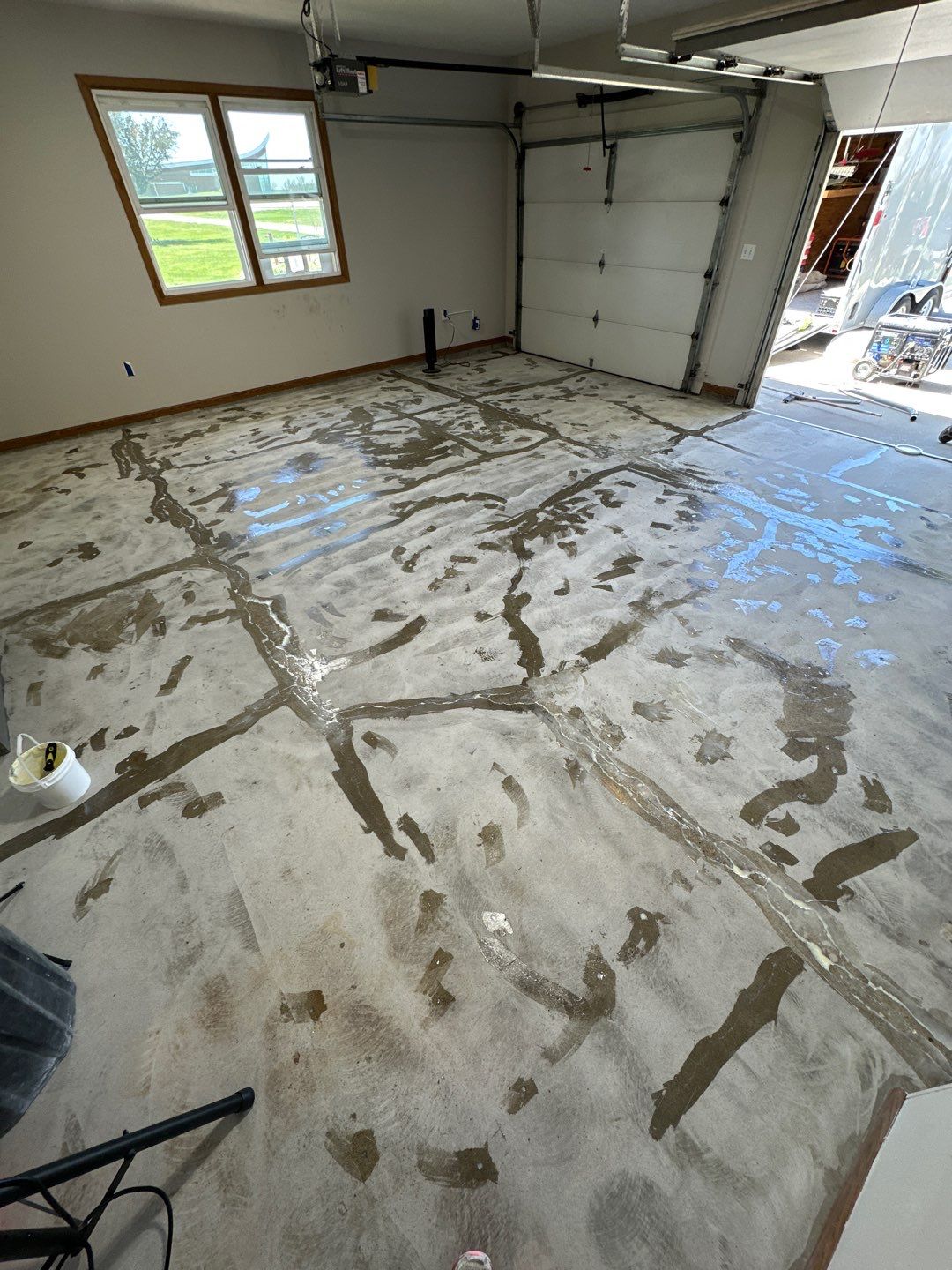 Epoxy Garage Floor Transformation and Concrete Repair in Beatrice by Goat Coatings