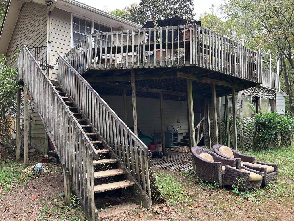 Atlanta, GA James Hardie Siding, Pressure Treated Wood Deck Replacement, and Exterior Painting by Nelson Exteriors 