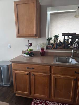 Two-Tone Kitchen Cabinet Refinishing in Sage Green and White