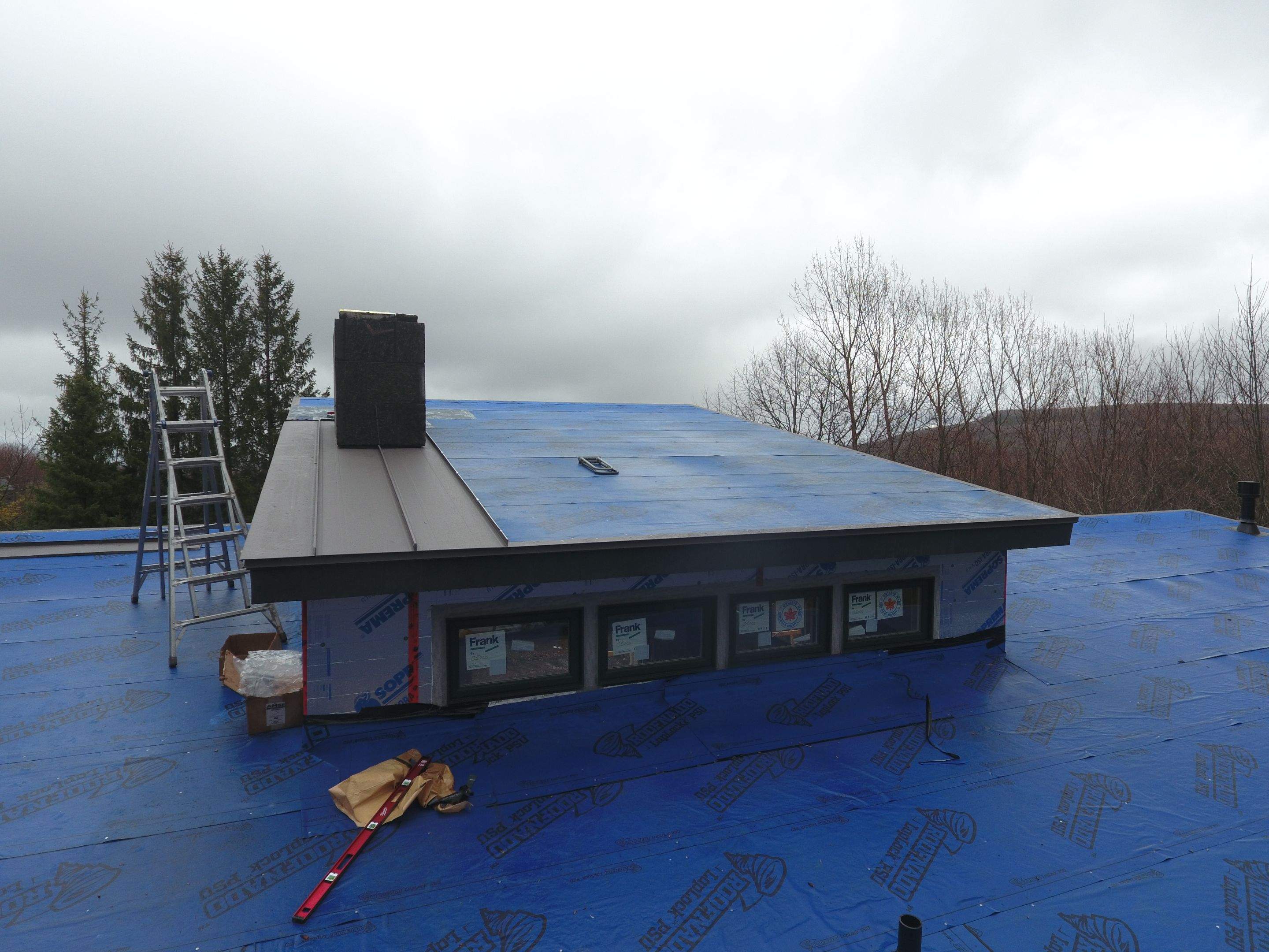 Residential Roofing Installation using 24 Ga Standing Seam Metal by Jay Carter Roofing & Sheet Metal