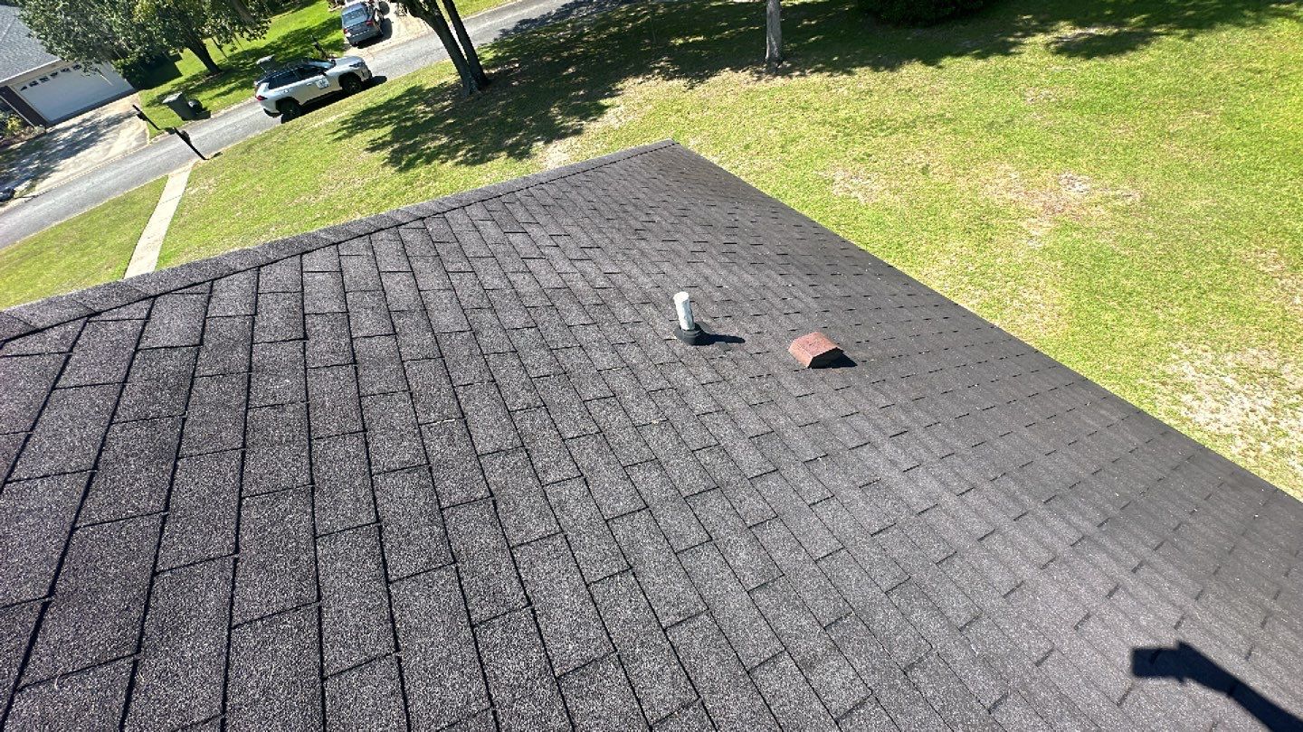 Residential Roofing Installation using Benton 26Ga 1inc Snapcock Metal Roof KYNAR Matte Black by Talya Roofing