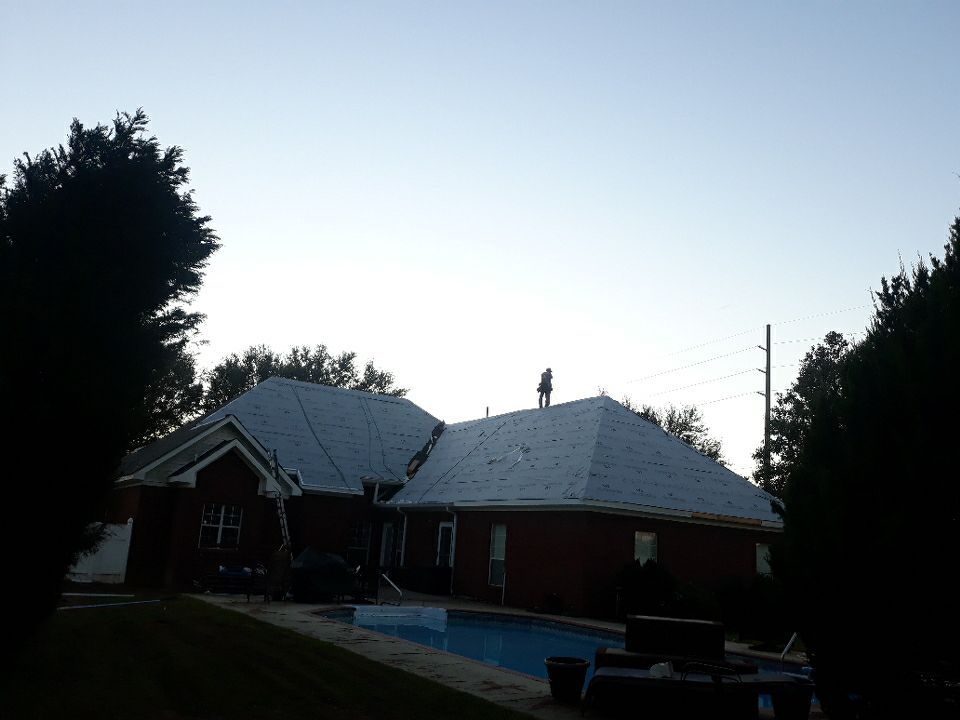 Residential Roofing Installation using Roof Replacement by American Roofing & Construction LLC