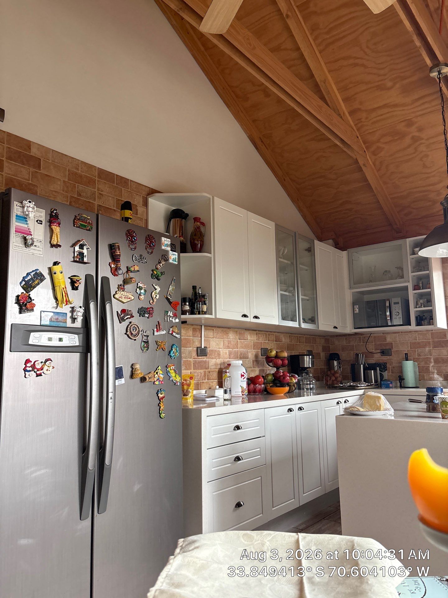 Modern Kitchen Remodel Featuring Vaulted Ceilings and White Shaker Cabinetry by CompanyCam Sales Demo