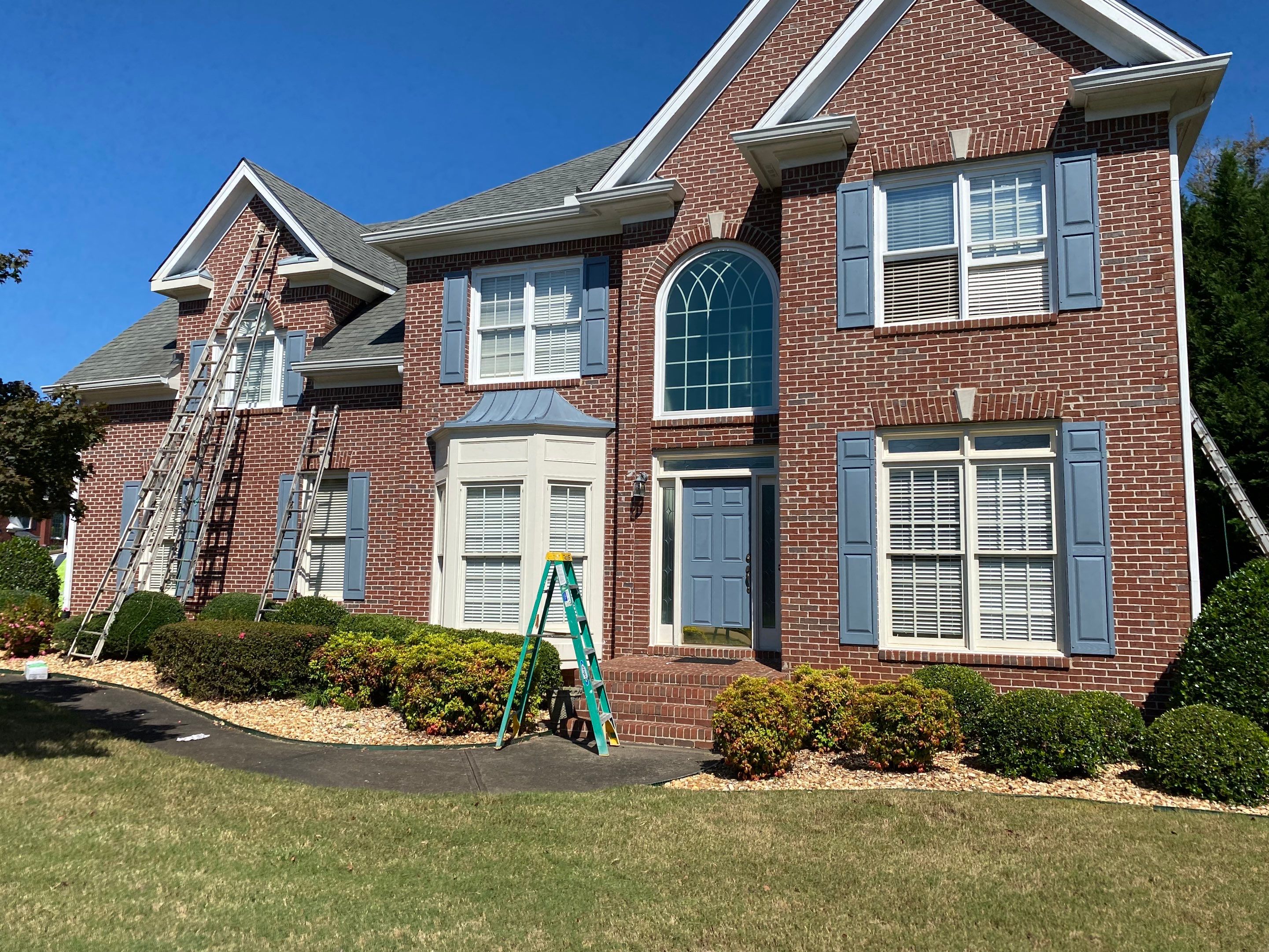 Exterior Painting and Trim Refresh for Duluth Brick Home by Swift Home Renovations