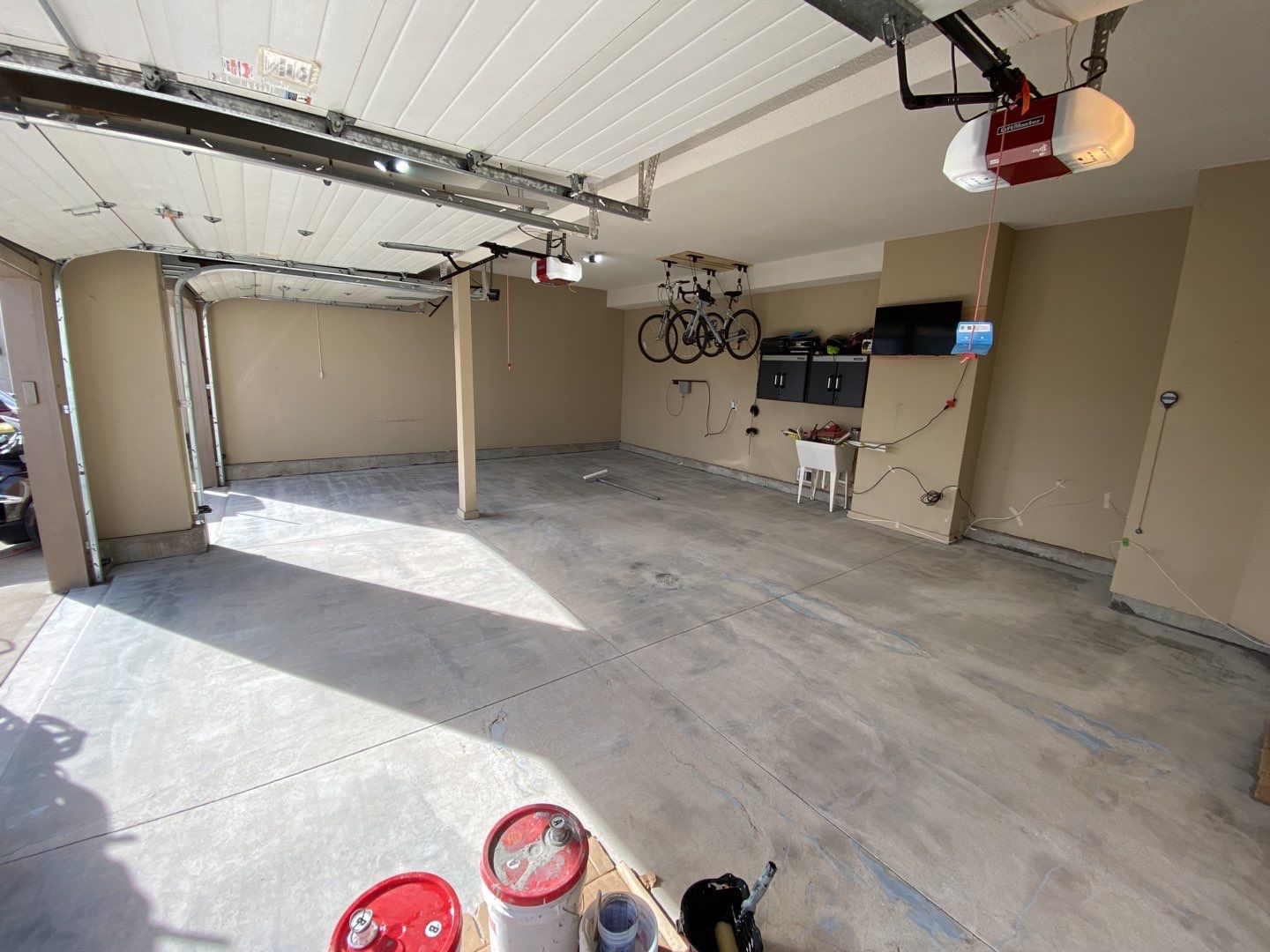 Garage using Slate Stone by Select Painting, Coatings & Garage Cabinets