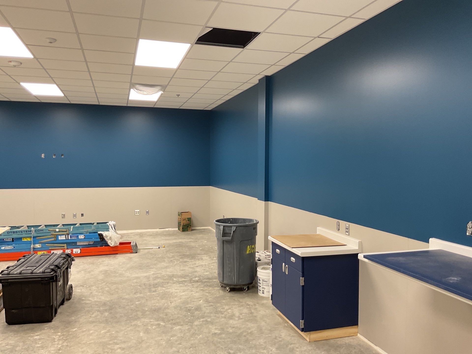 New Commercial Build Painting by Select Painting, Coatings & Garage Cabinets